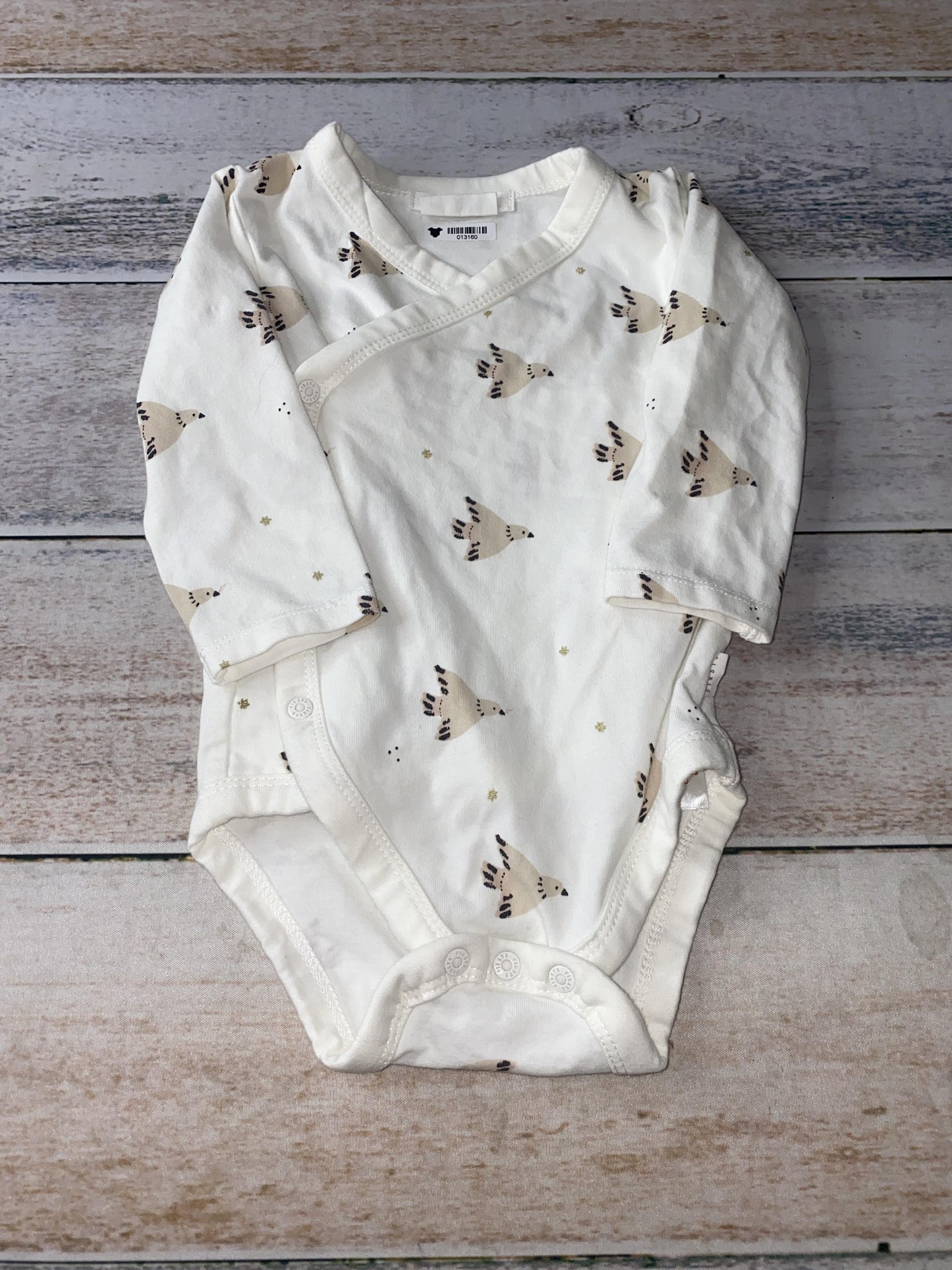 Firsts Unisex Onesie Size: 6 months