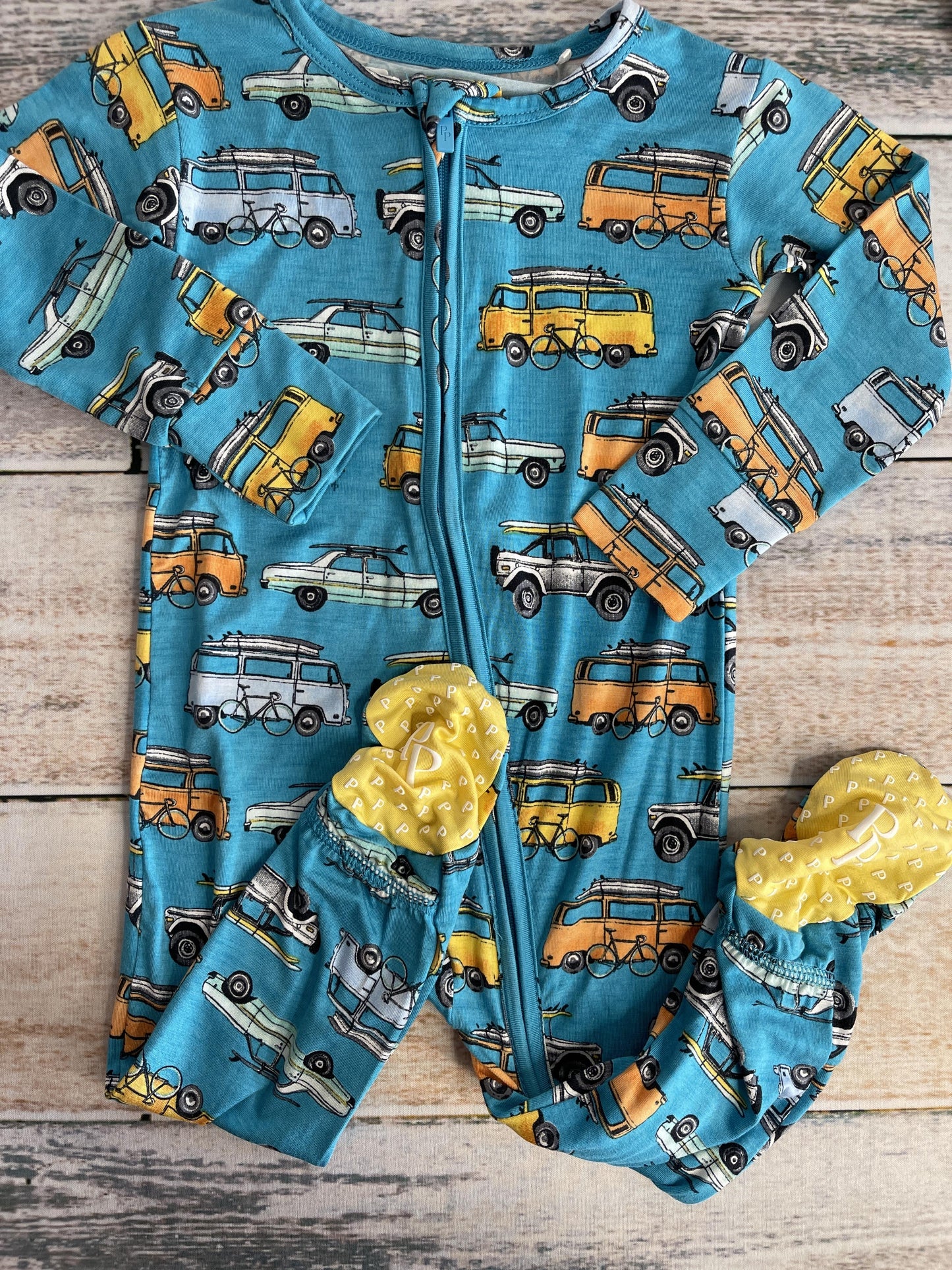 Posh Peanut Boys Light Blue | Yellow | Trucks Pajamas Size: 6-12 months Light Blue | Yellow | Trucks