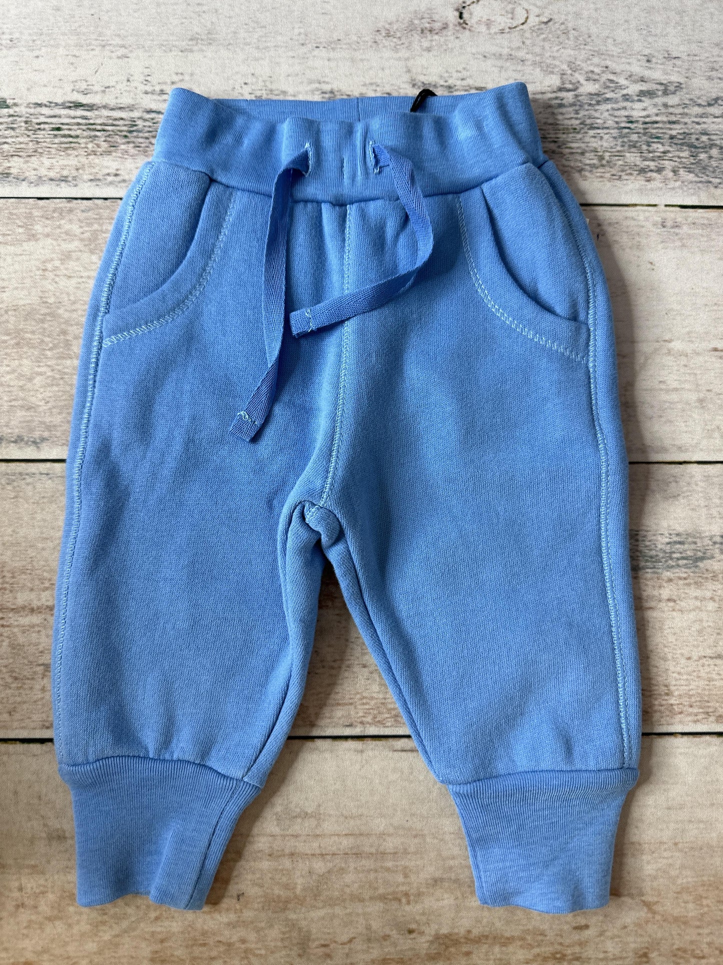 Unisex Light Blue Pants Size: 6-9 months Light Blue