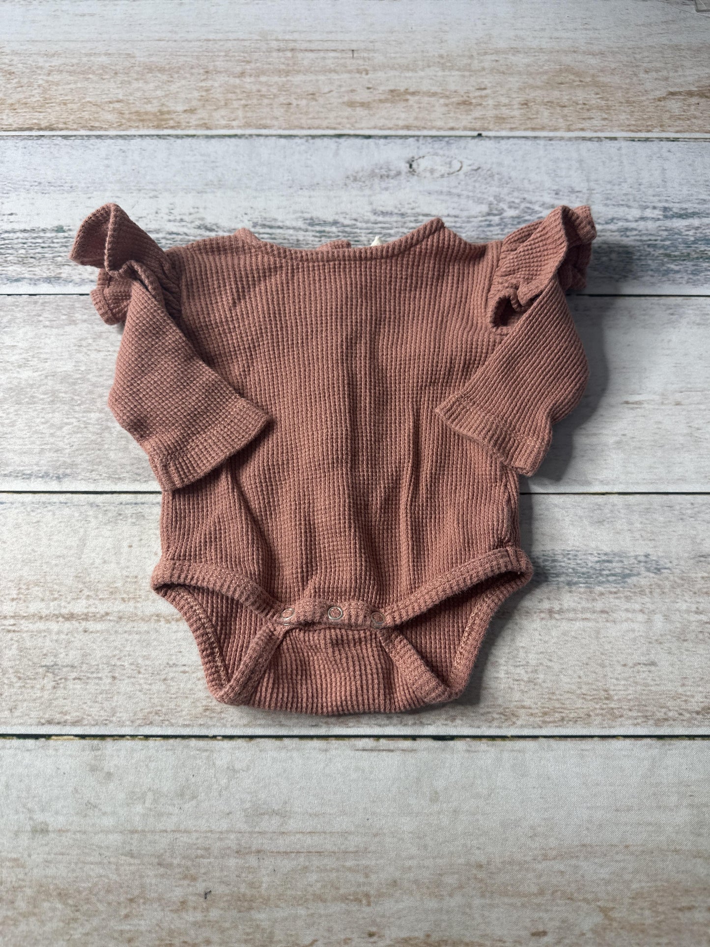 Kate Quinn Unisex Onesie Size: Newborn