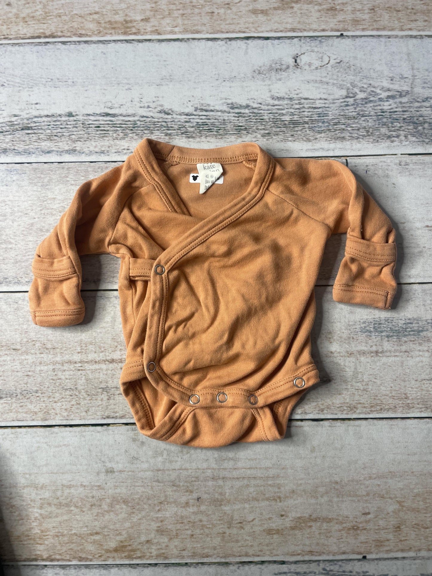 Kate Quinn Unisex Onesie Size: Newborn