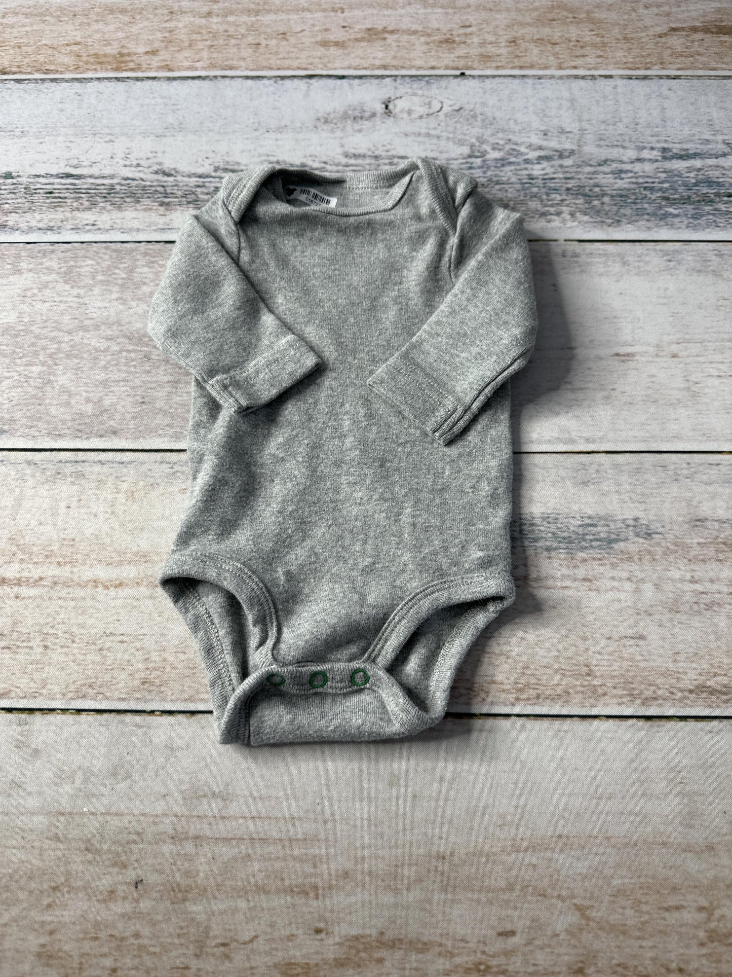 Primary Unisex Onesie Size: Newborn