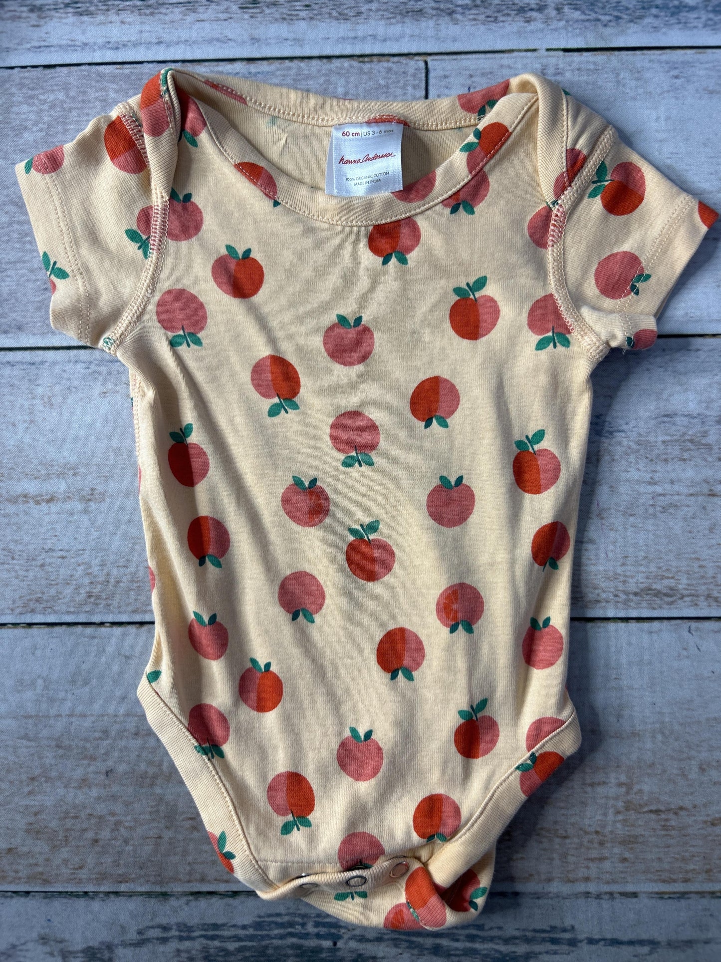 Unisex orange | Red Onesie Size: 3-6 months orange | Red