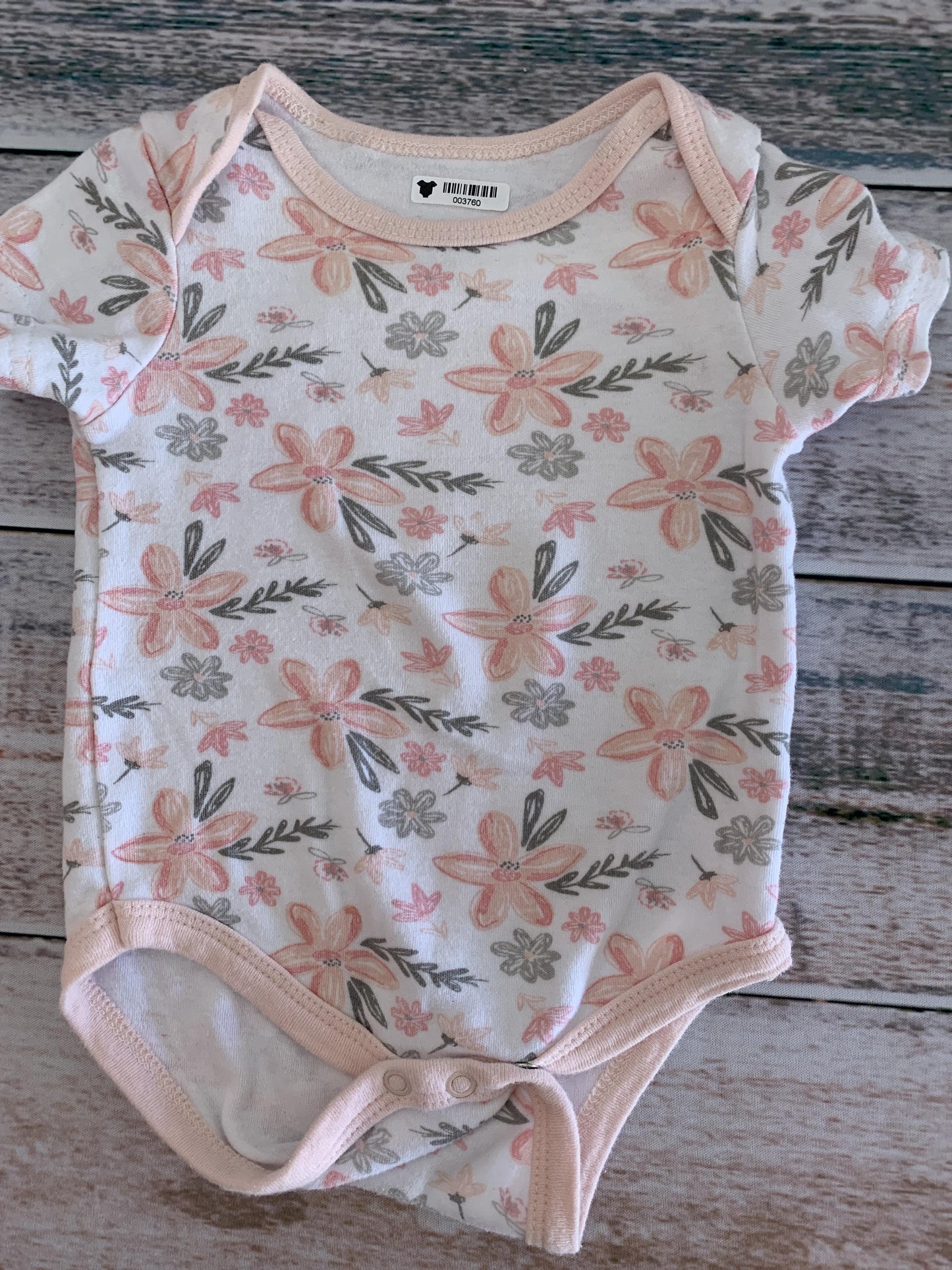Girls Pink floral Onesie Size: 6-9 months Pink floral