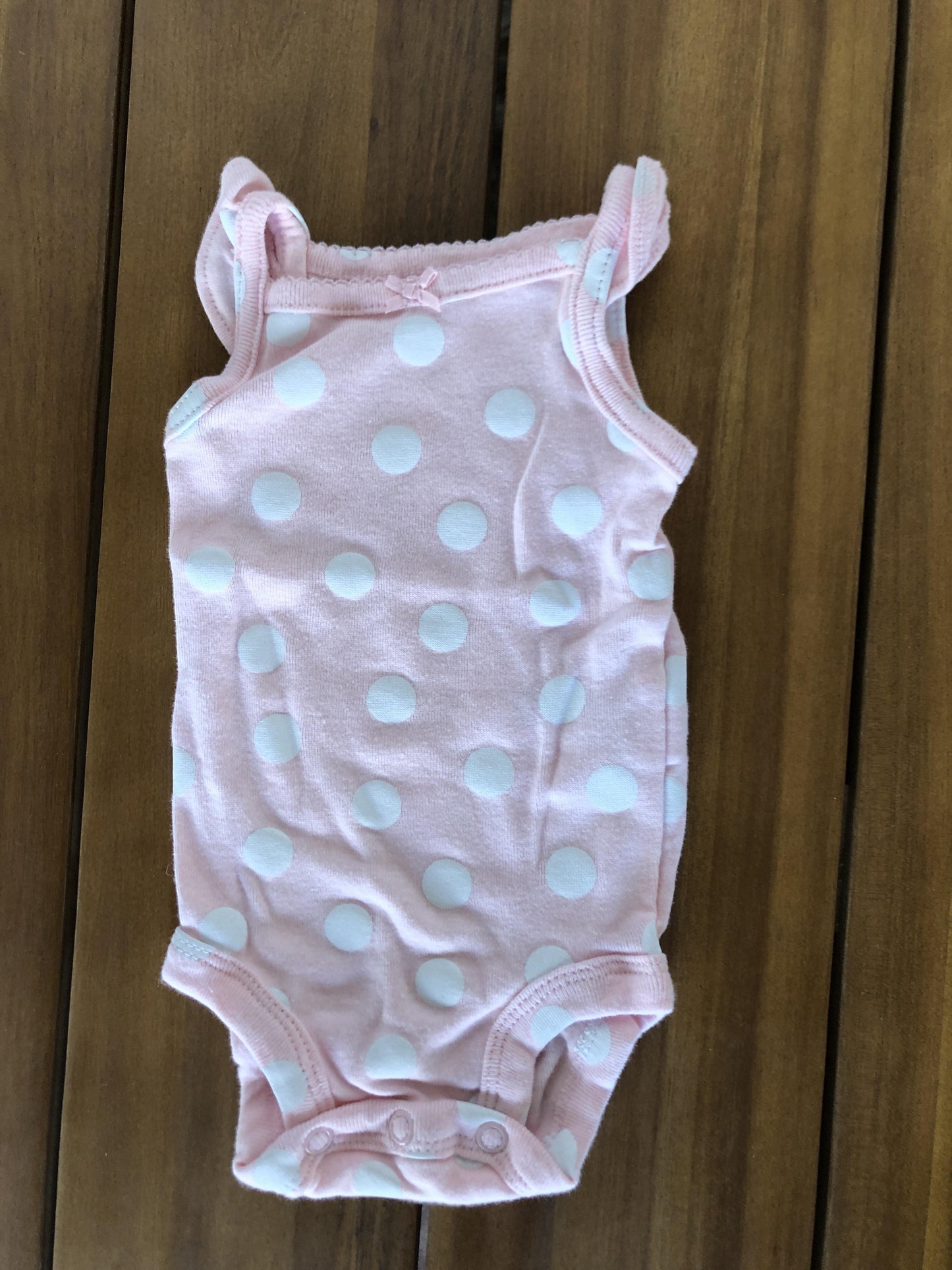 Carters Girls pink | polka dot Onesie Size: Newborn pink | polka dot