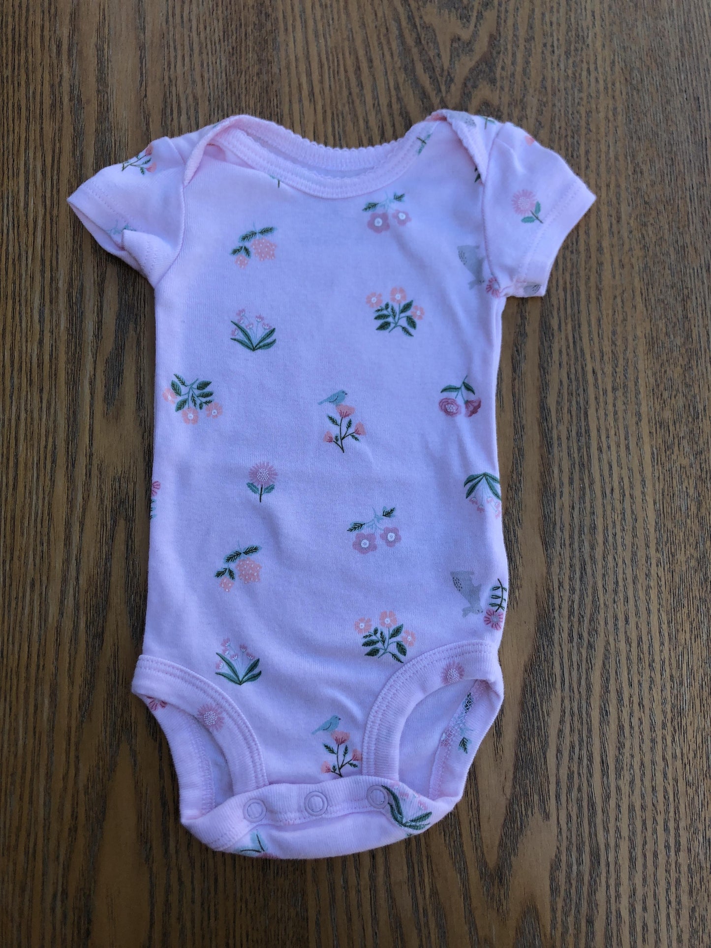 Carters Girls pink Onesie Size: Newborn pink