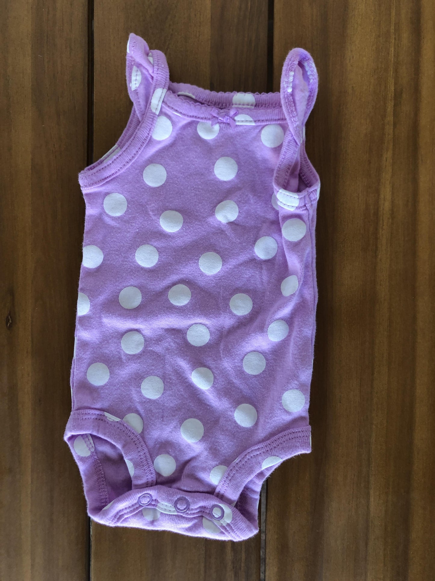 Carters Girls purple | polka dot Onesie Size: Newborn purple | polka dot