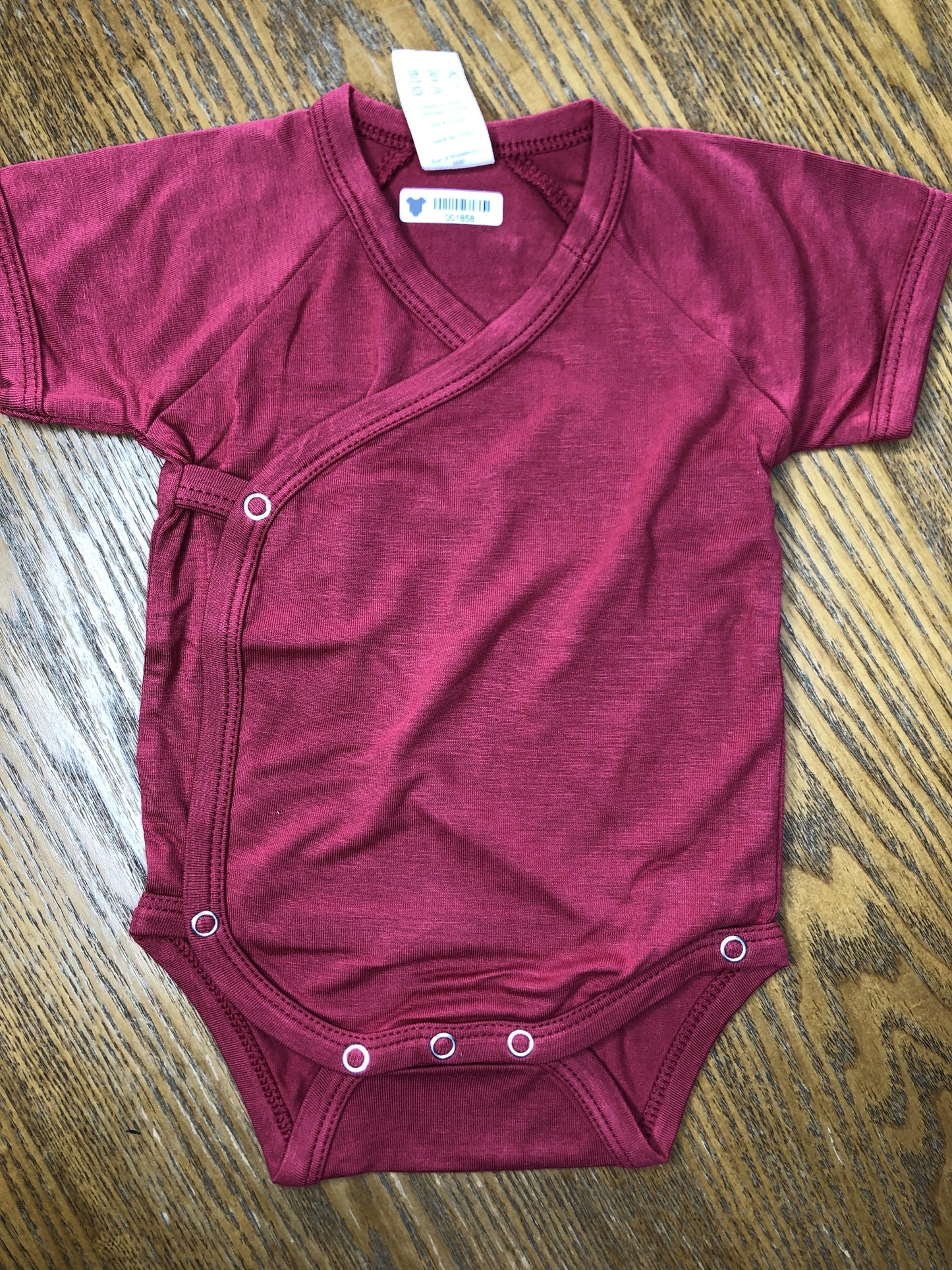 Kate Quinn Unisex Red Onesie Size: Newborn Red