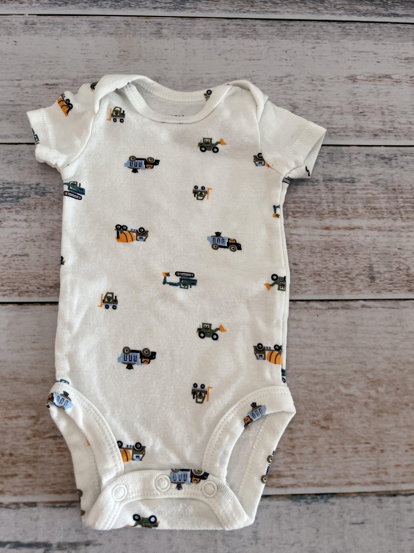 Carters Boys White | Trucks Onesie Size: Newborn White | Trucks