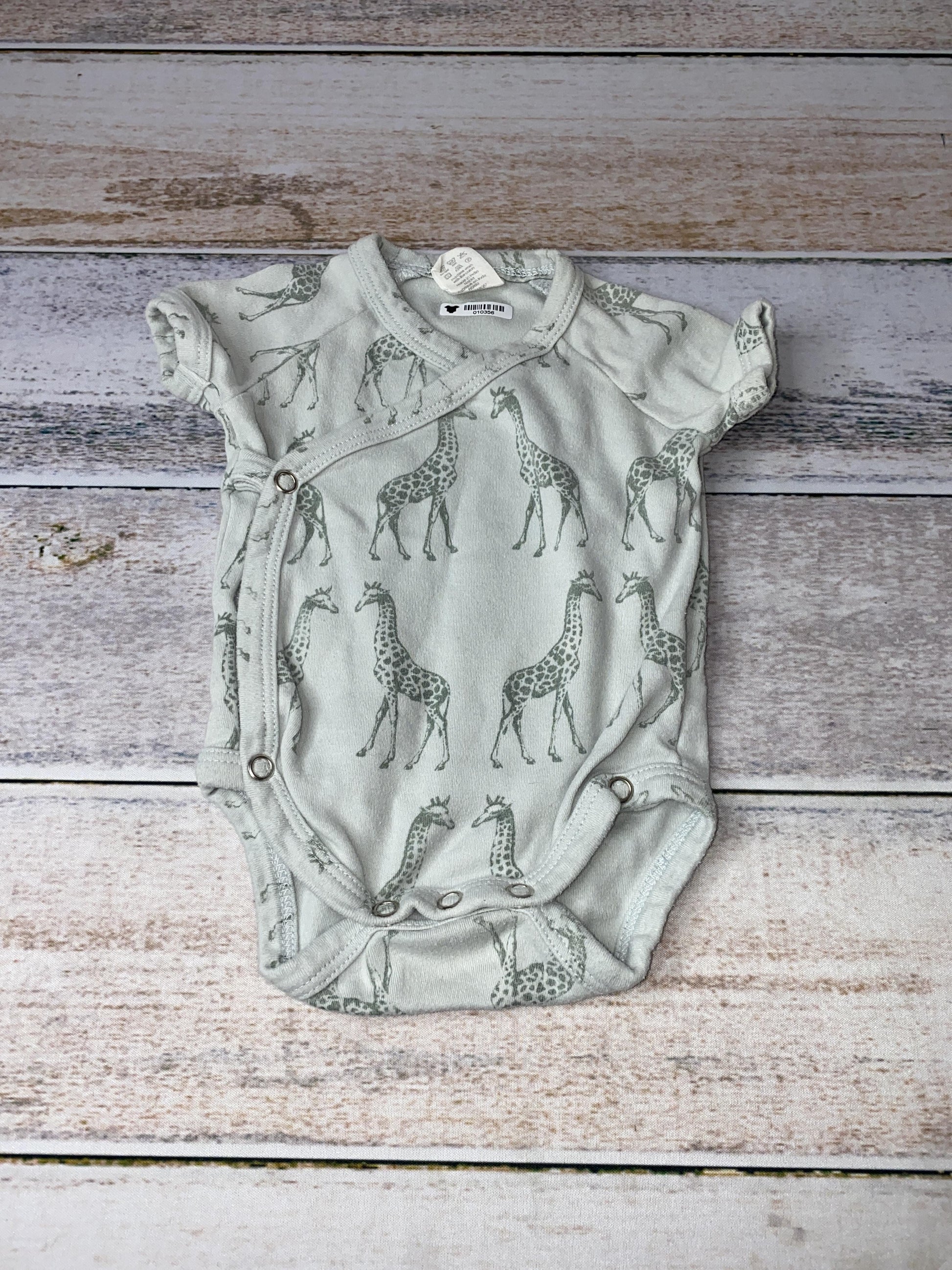 Kate Quinn Unisex Onesie Size: 0-3 months