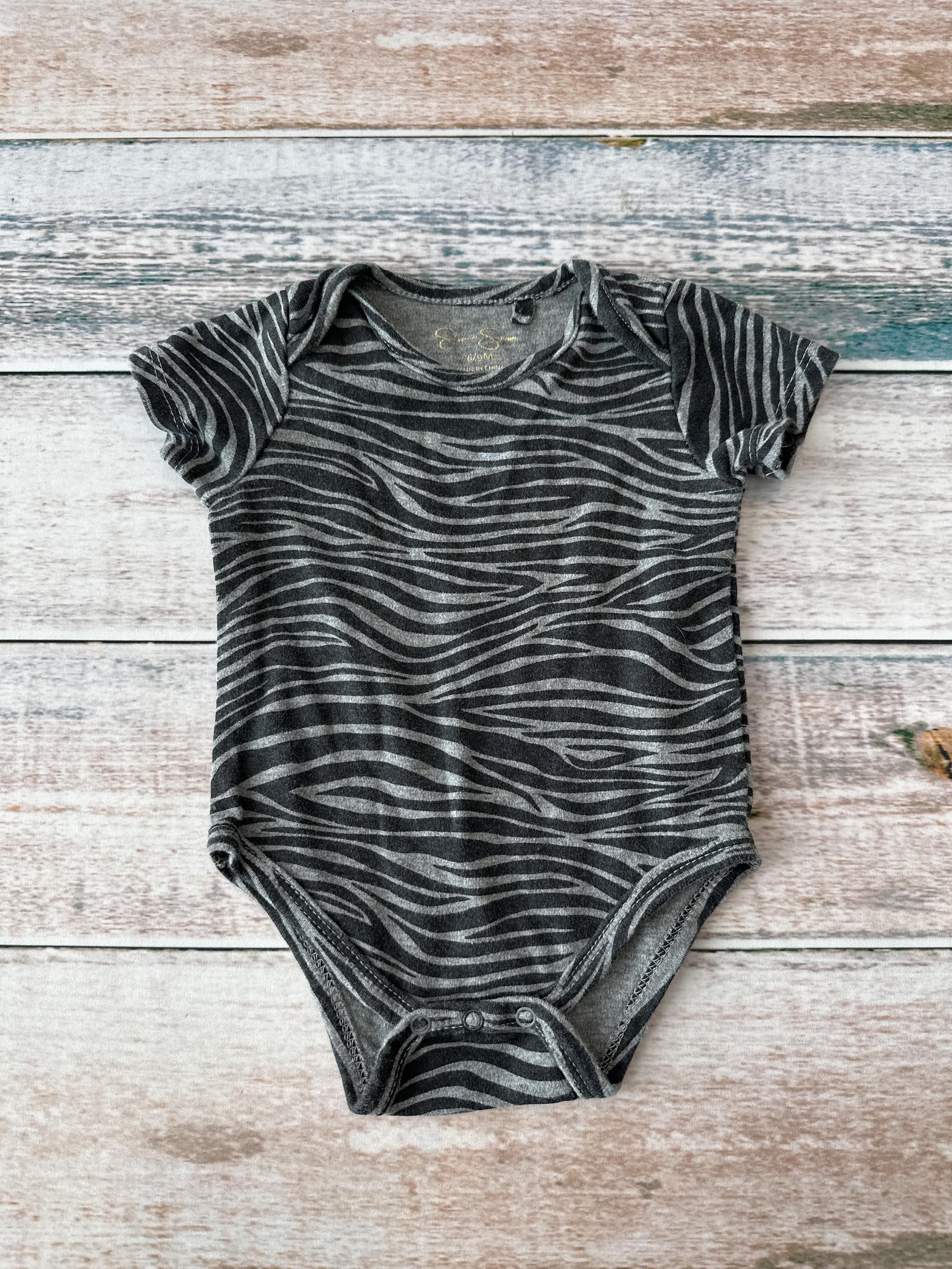 Jessica Simpson Girls Black | Grey | Animal Print Onesie Size: 6-9 months Black | Grey | Animal Print