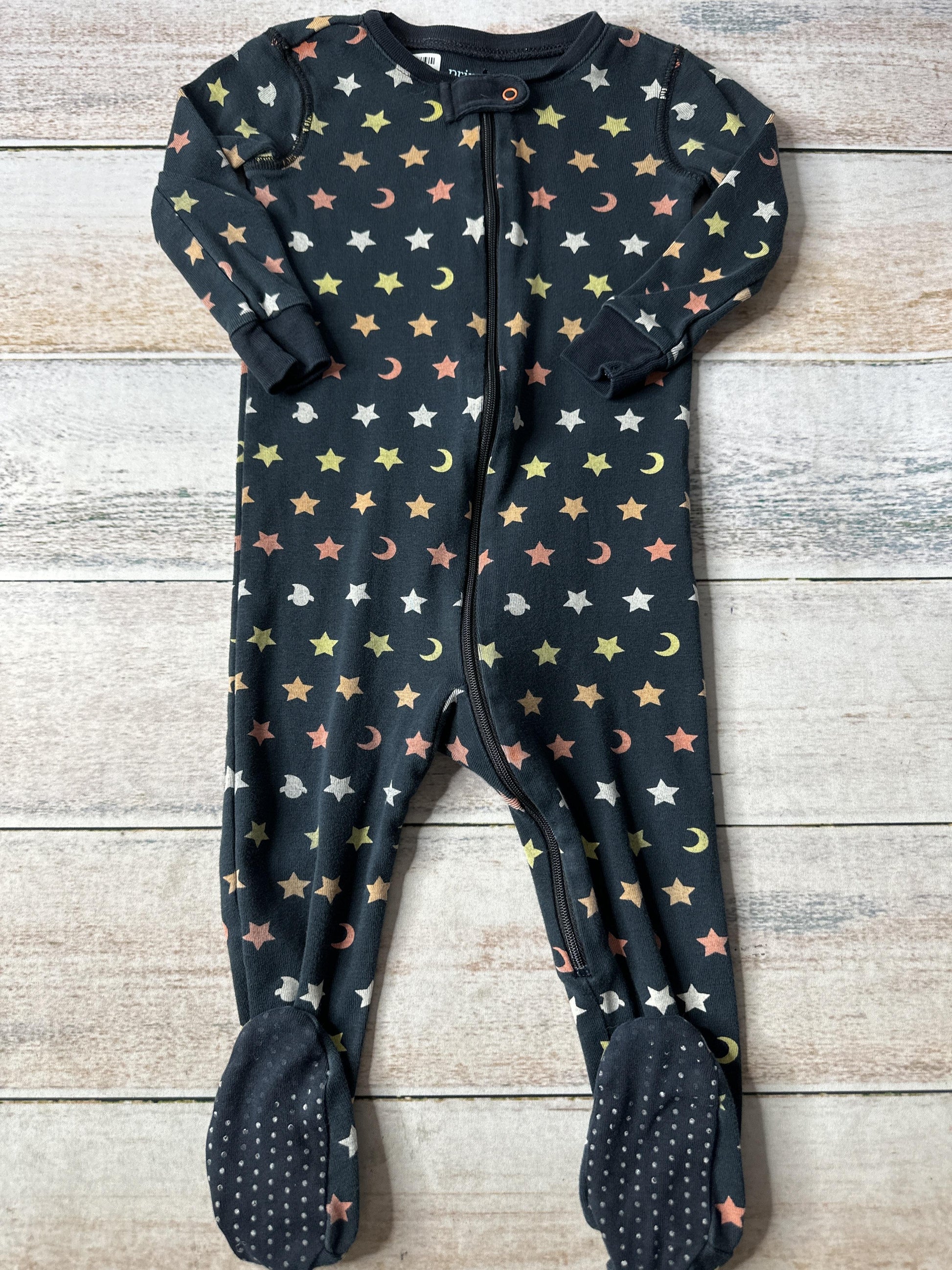 Primary Boys Black | White | orange | Yellow Pajamas Size: 12-18 months Black | White | orange | Yellow