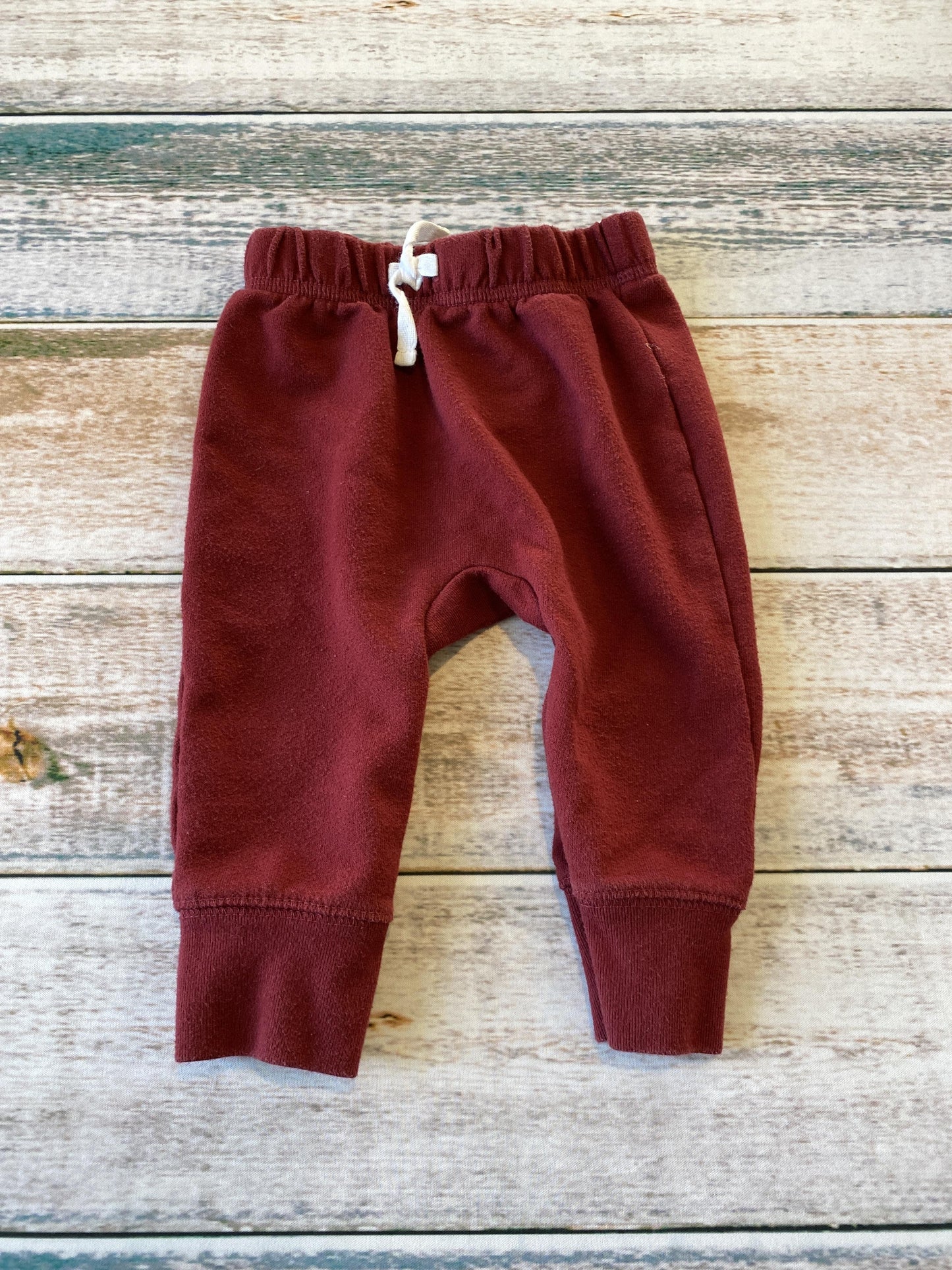 Unisex Burgundy Pants Size: 6-9 months Burgundy