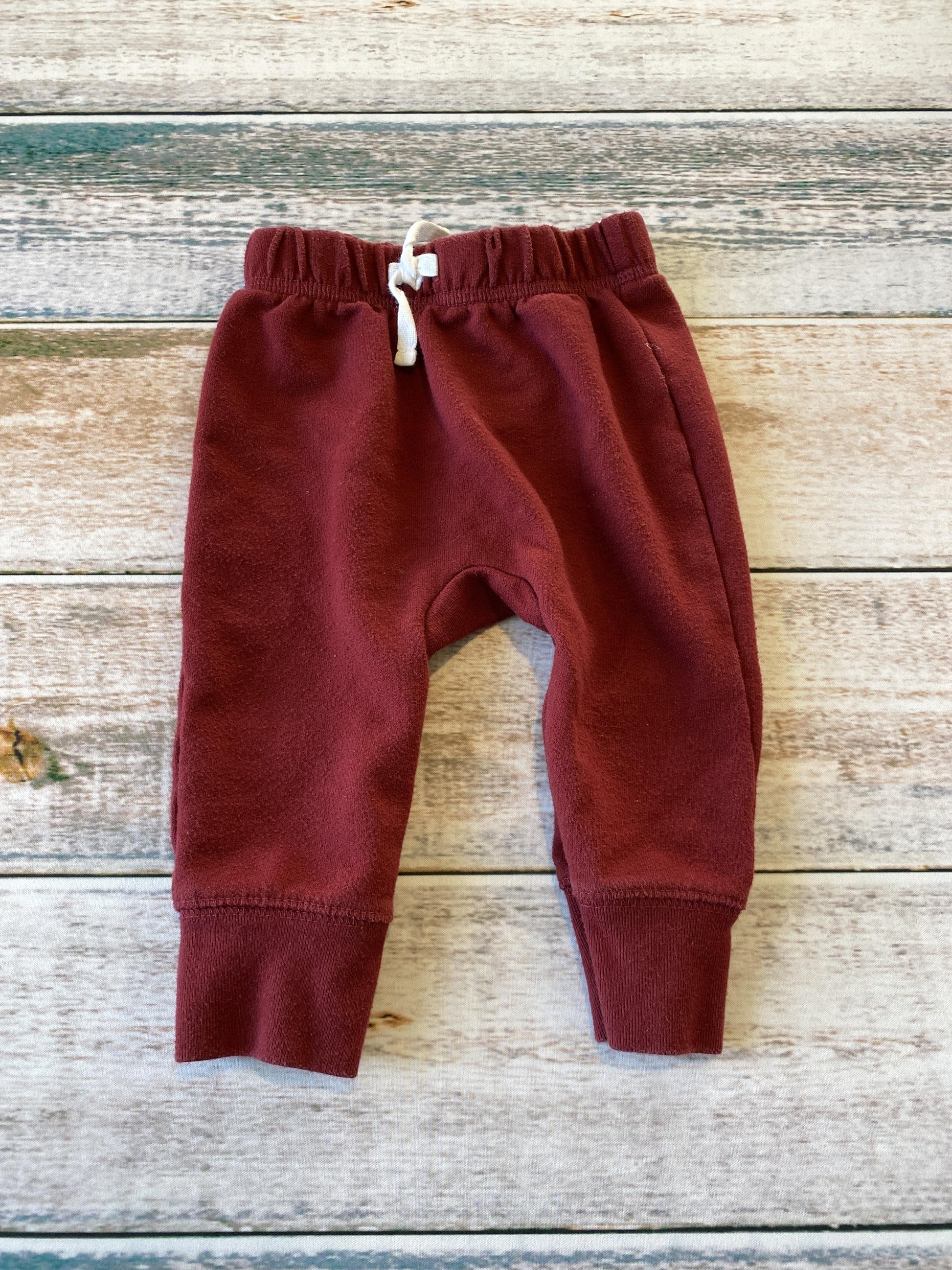 Unisex Burgundy Pants Size: 6-9 months Burgundy
