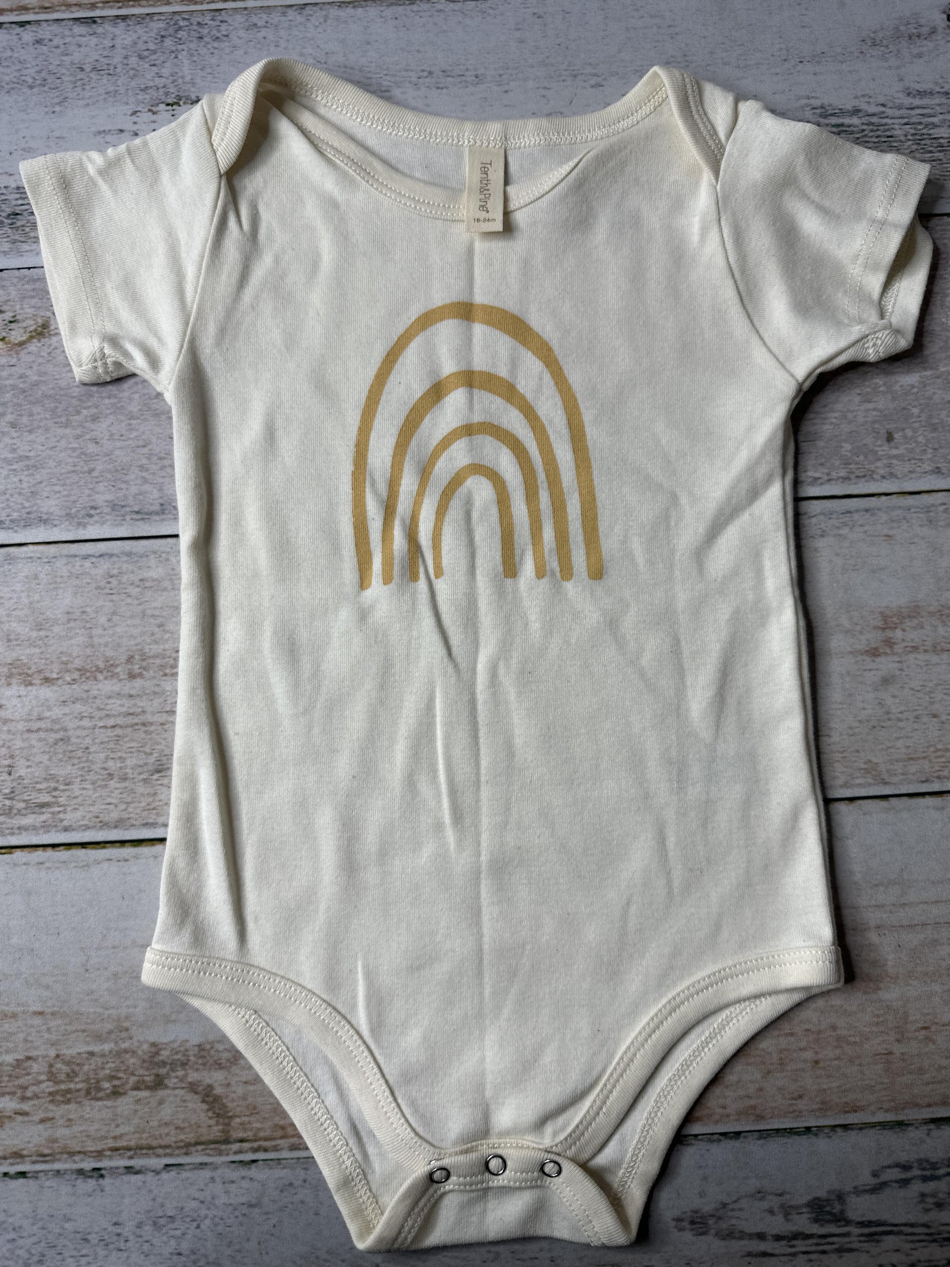 Tenth + Pine Unisex cream | Brown | Rainbow Onesie Size: 18-24 months cream | Brown | Rainbow