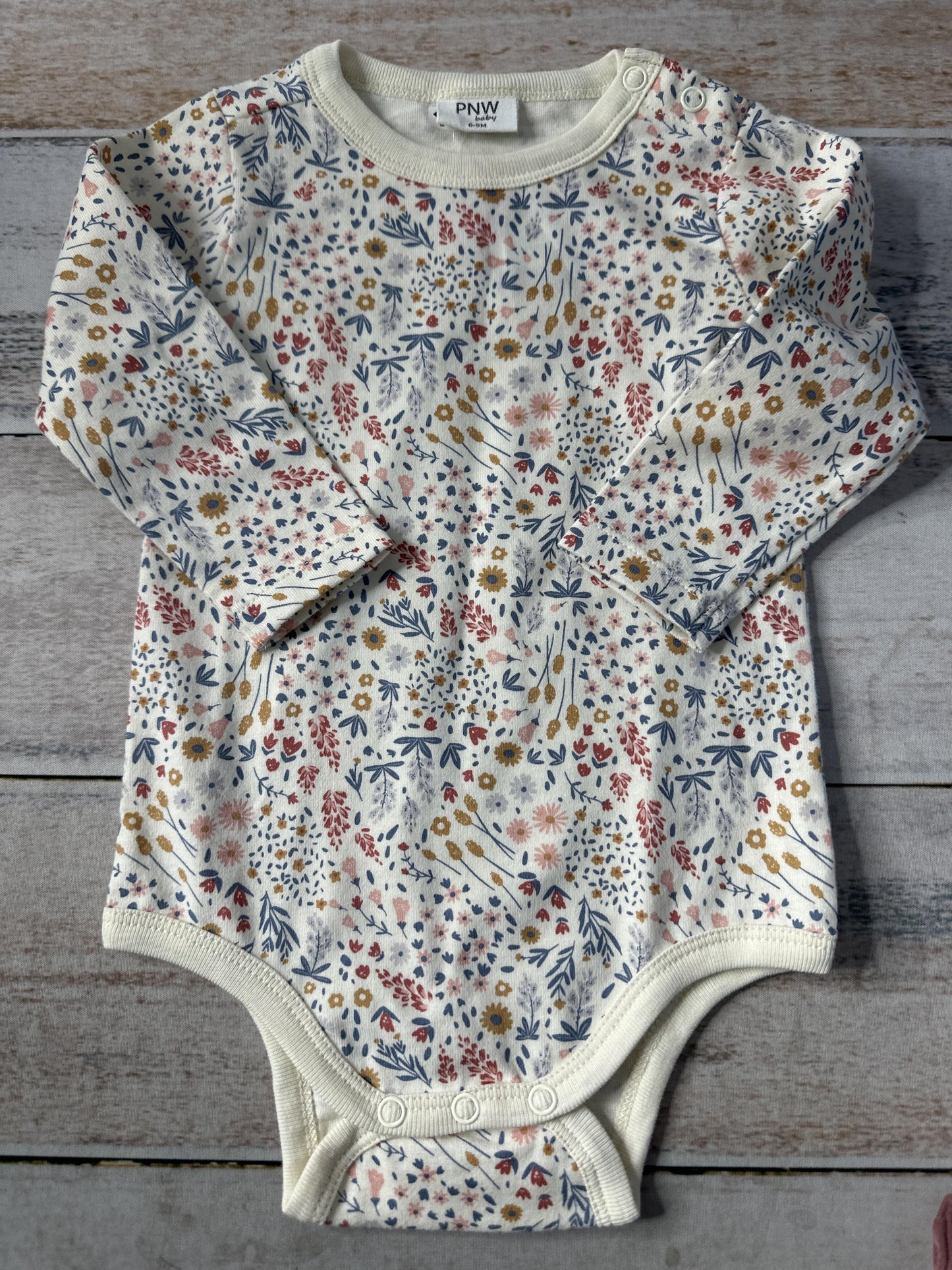 PNW Girls cream | Pink floral Onesie Size: 6-9 months cream | Pink floral