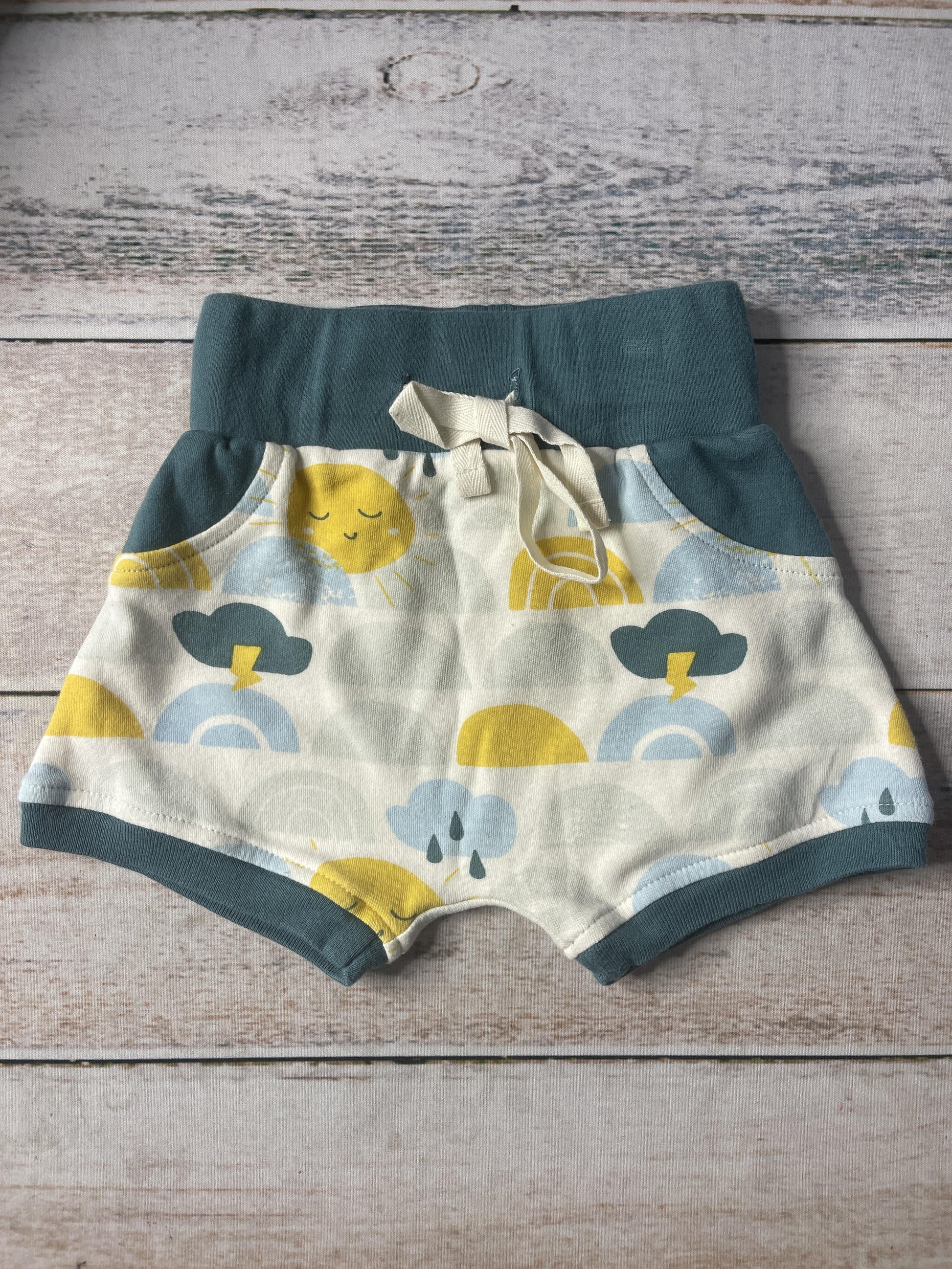 Cat & Dogma Unisex cream | Sun | Teal Shorts Size: 3-6 months cream | Sun | Teal