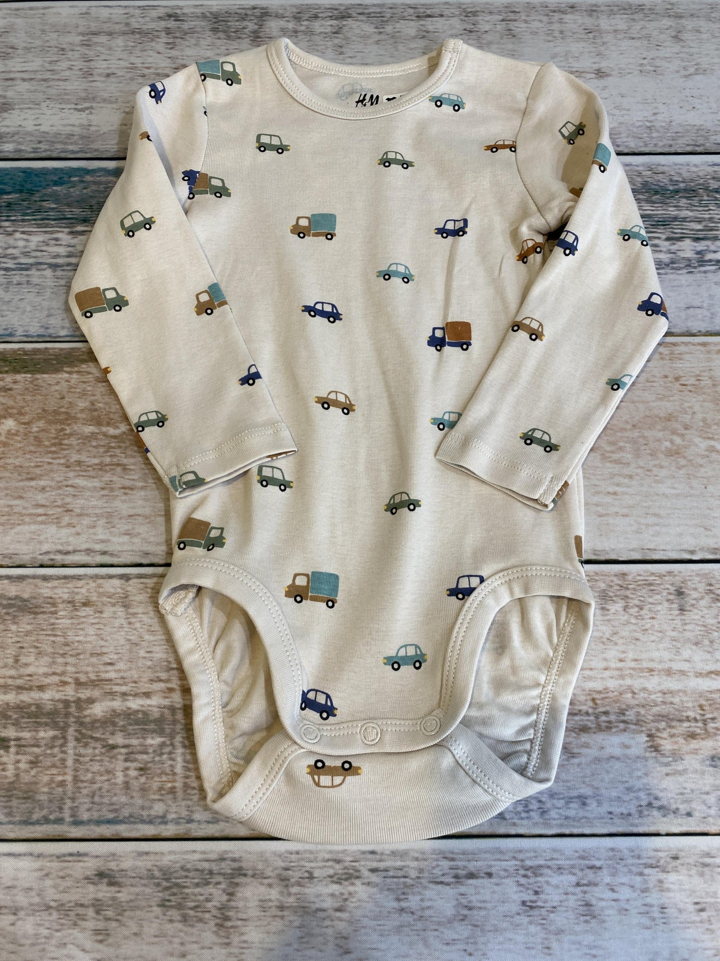 H&M Boys cream | Trucks Onesie Size: 12 months cream | Trucks