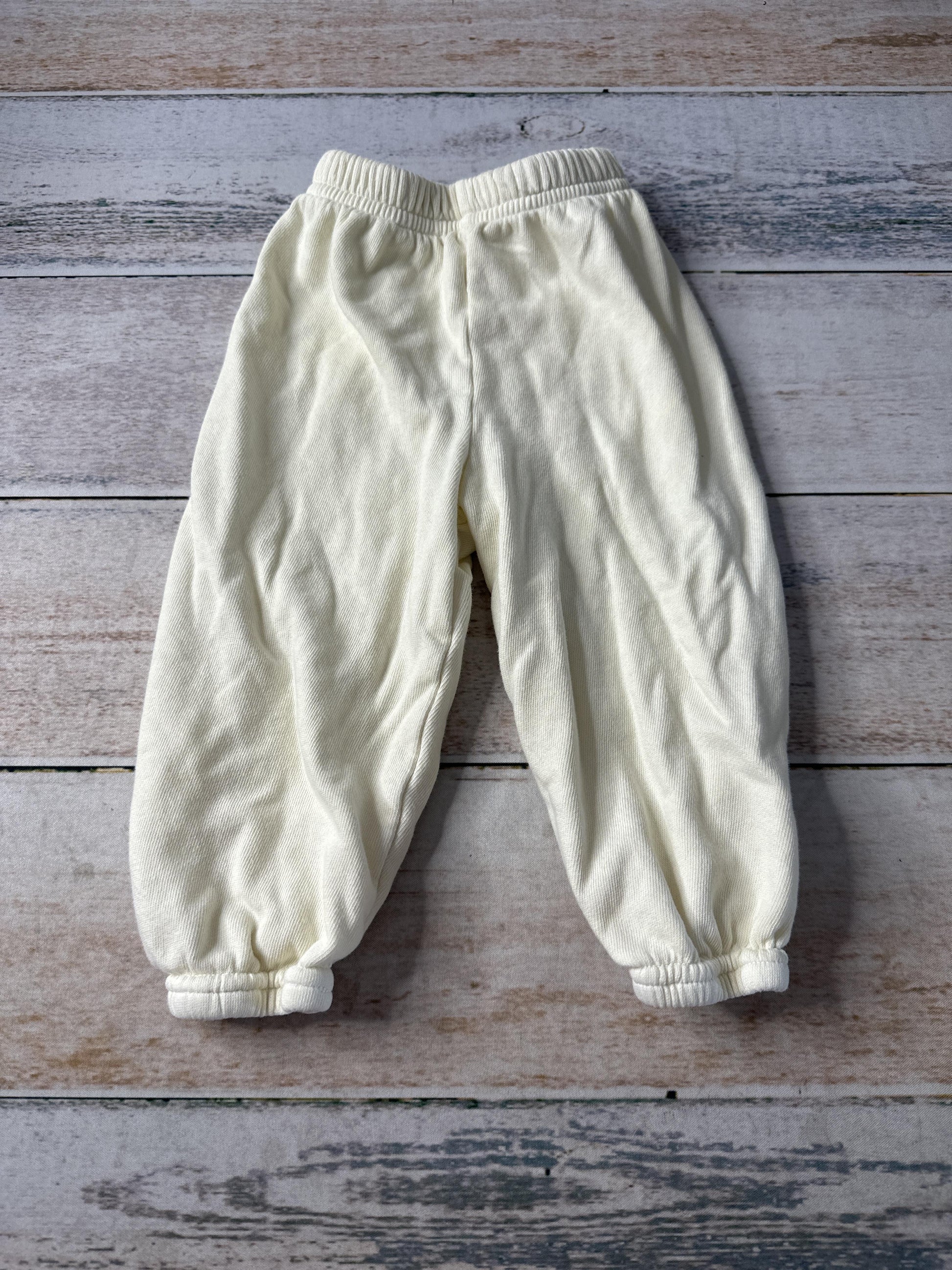 All the babies Unisex cream Pants Size: 6-12 months cream