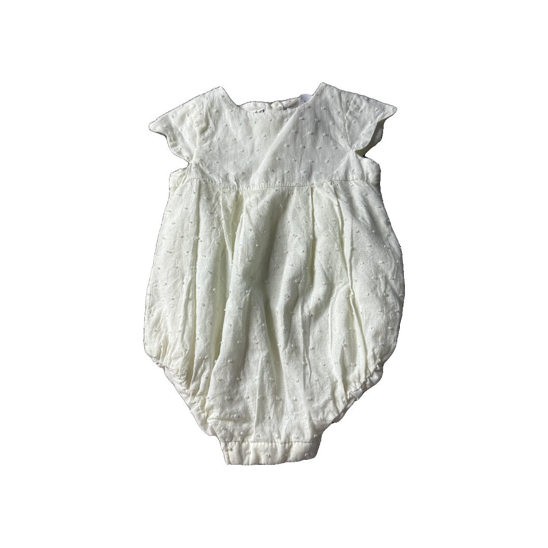 Girls cream Romper Size: 6-9 months cream