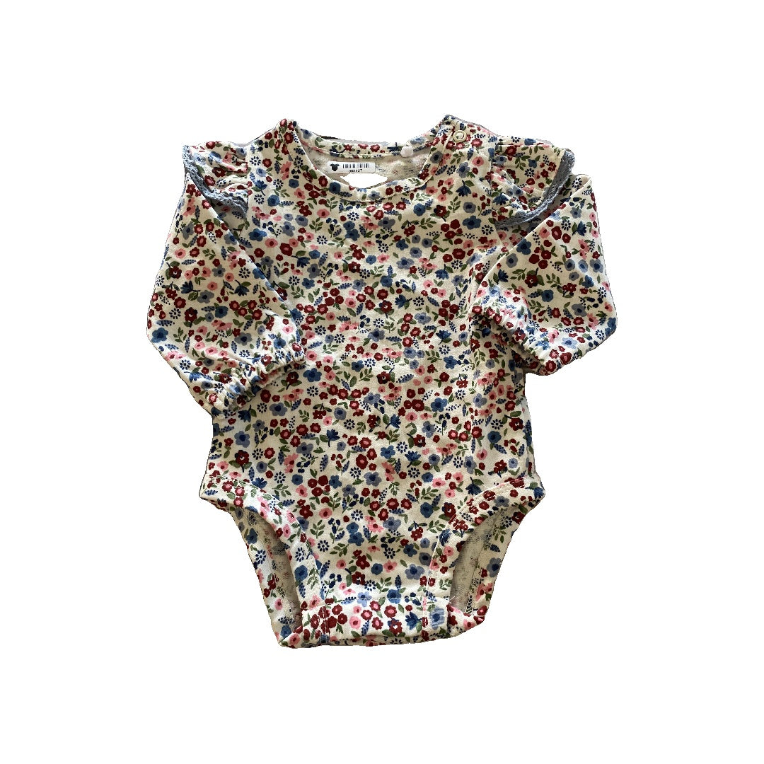 Oliver & Rain Girls Flowers Onesie Size: Newborn Flowers