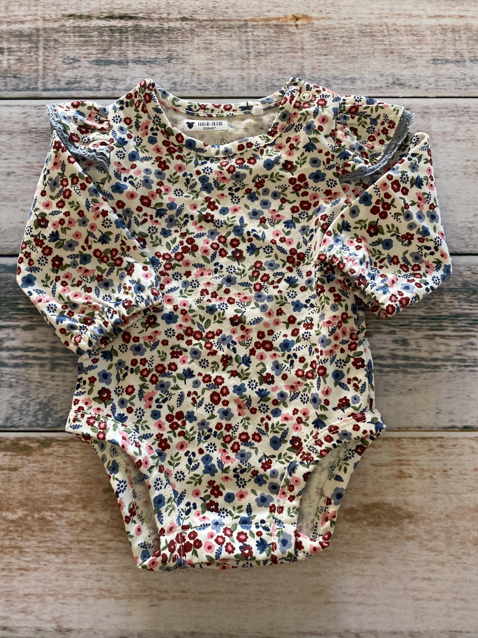Oliver & Rain Girls Flowers Onesie Size: Newborn Flowers