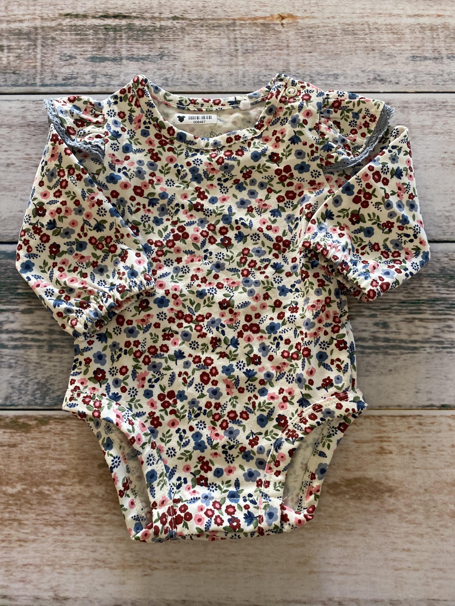 Oliver & Rain Girls Flowers Onesie Size: Newborn Flowers
