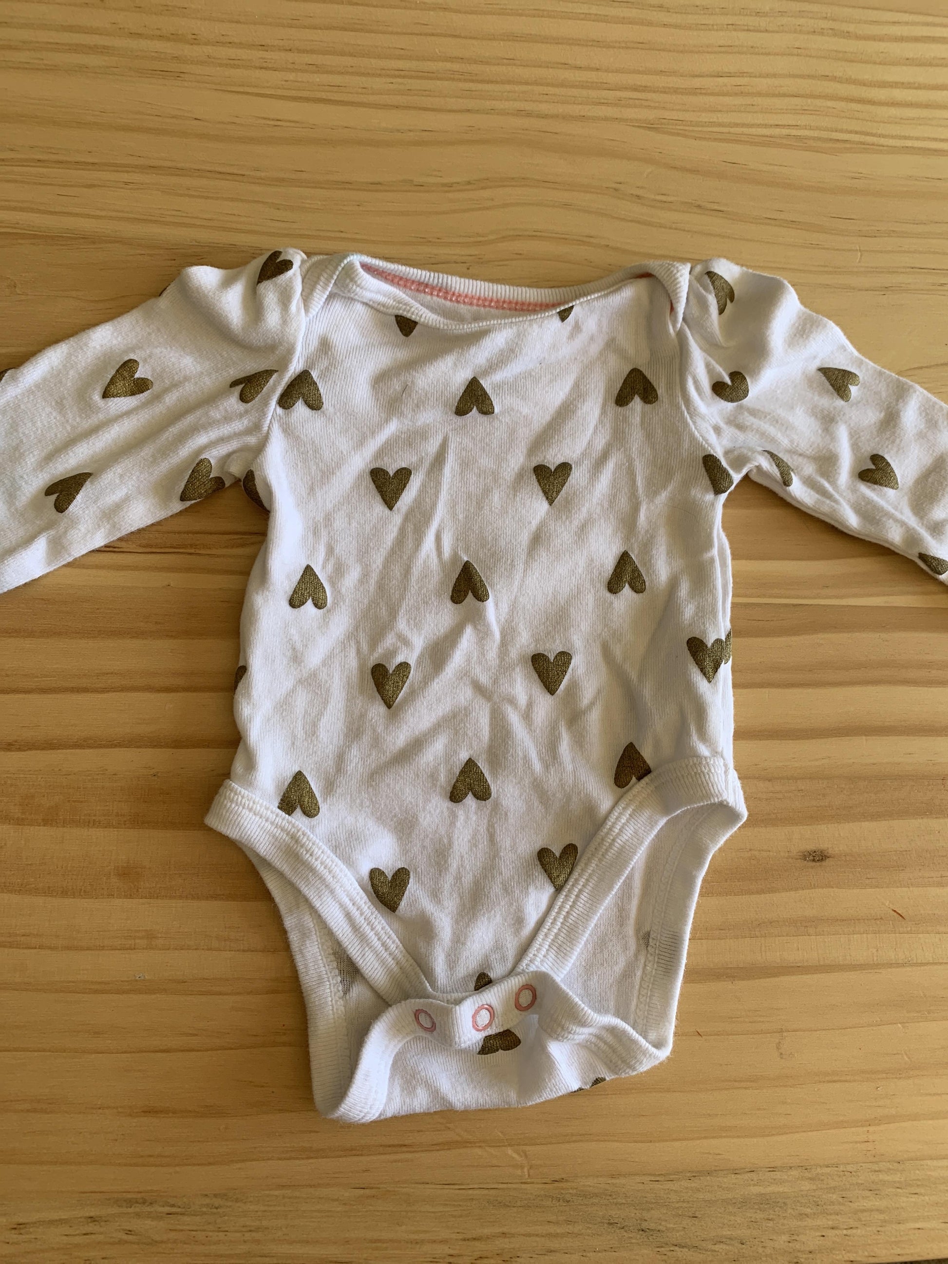 Girls Gold | White | Hearts Onesie Size: Newborn Gold | White | Hearts