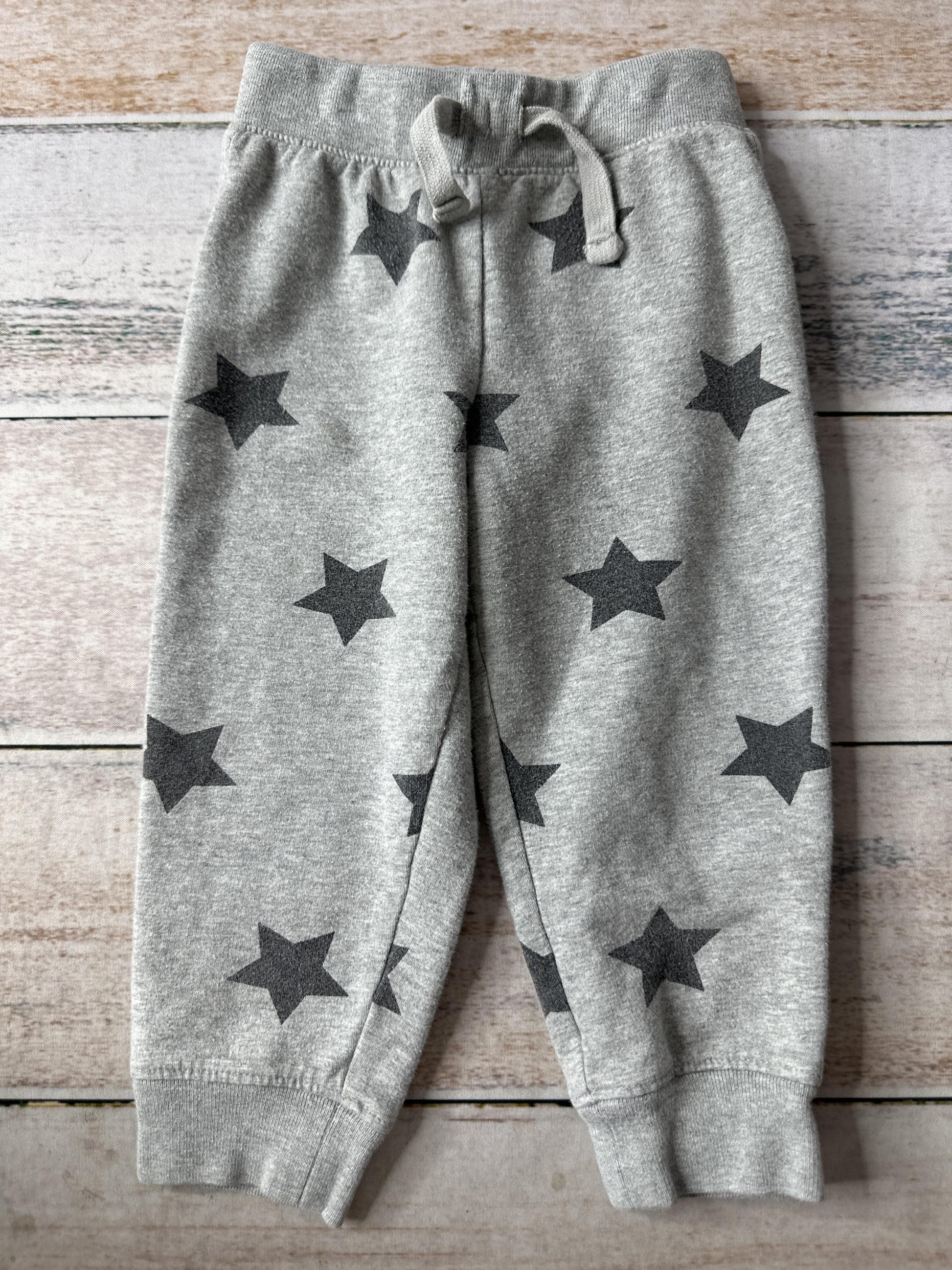 Primary Unisex Grey | Black | Stars Pants Size: 12-18 months Grey | Black | Stars