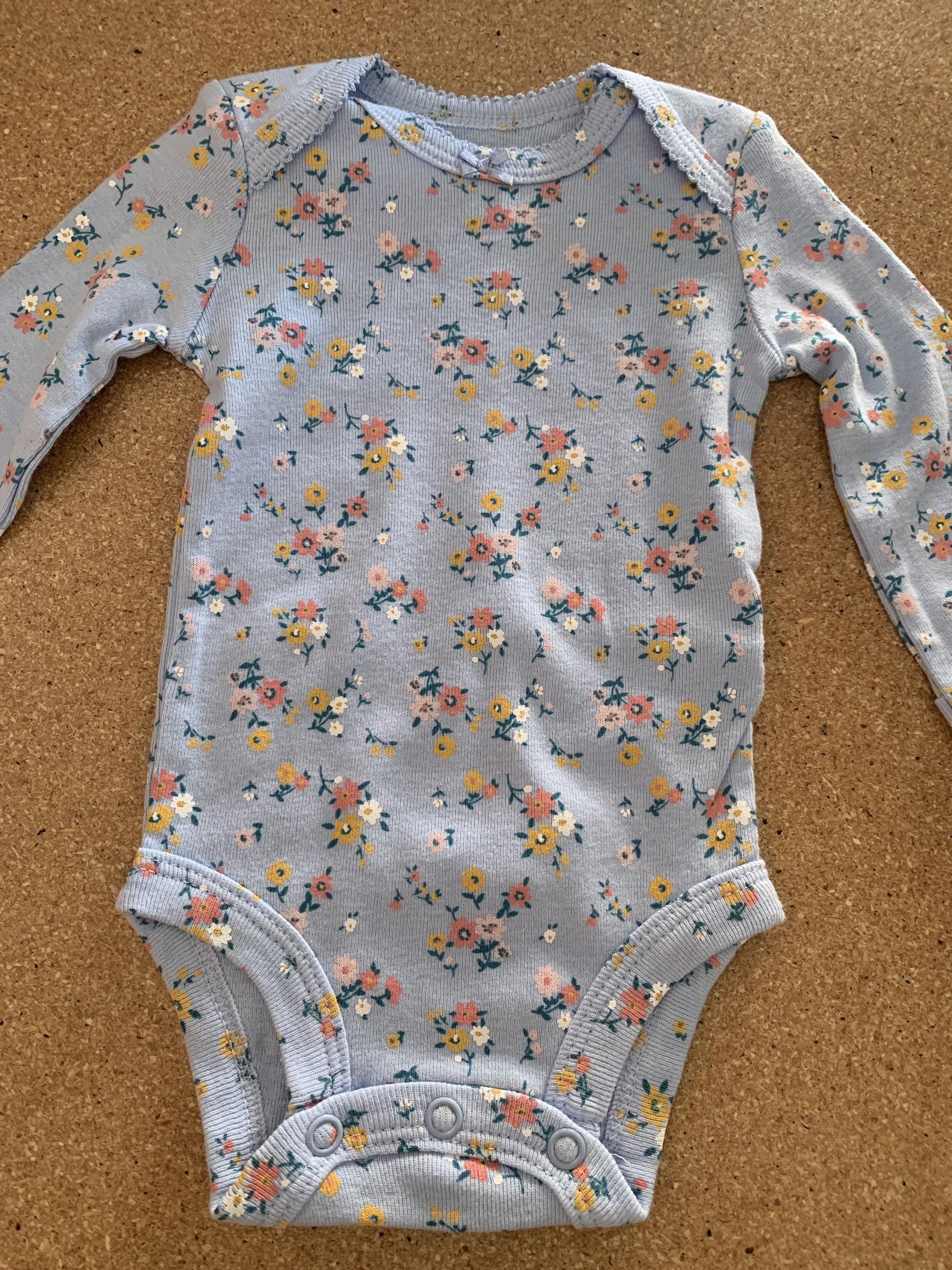 Girls Light Blue | Pink floral Onesie Size: Newborn Light Blue | Pink floral