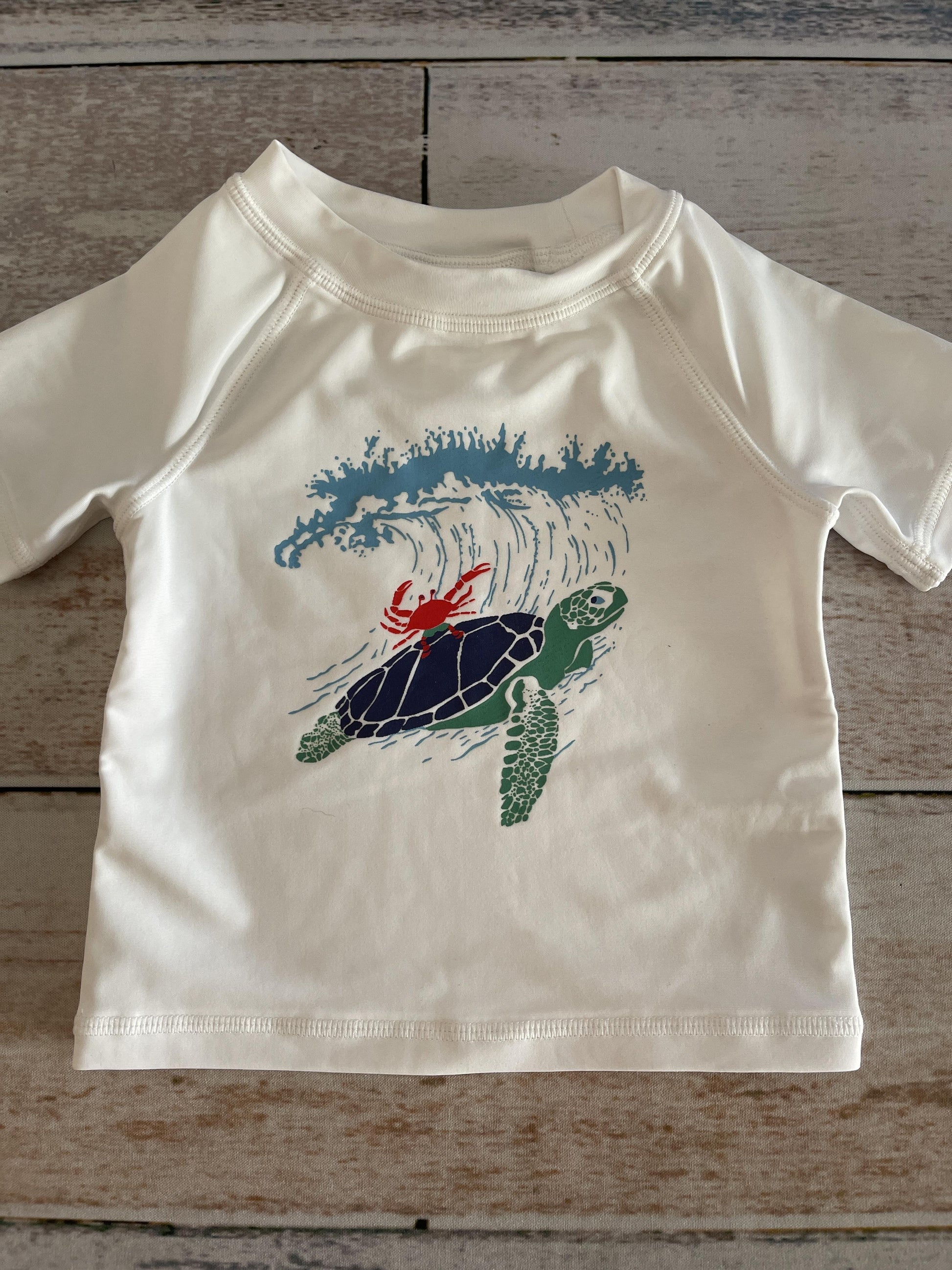 Unisex light green | Wool White | White | Red Swimwear Size: 3-6 months light green | Wool White | White | Red