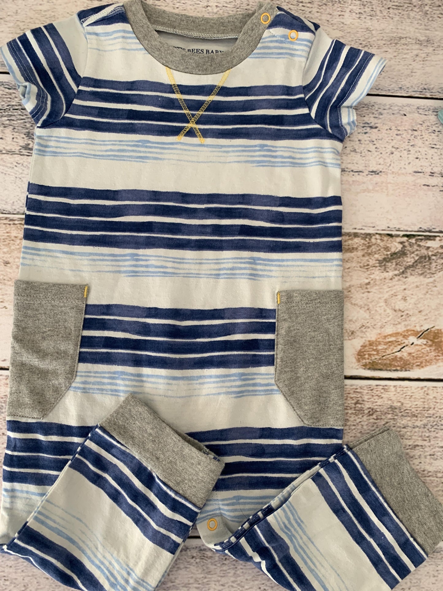 Burt's Bees Boys Navy Blue | Light Blue | White | Yellow | Stripe Romper Size: 3-6 months Navy Blue | Light Blue | White | Yellow | Stripe