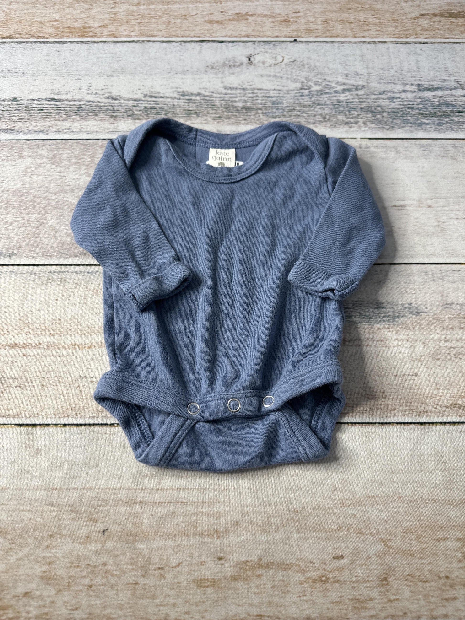 Kate Quinn Unisex Onesie Size: Newborn