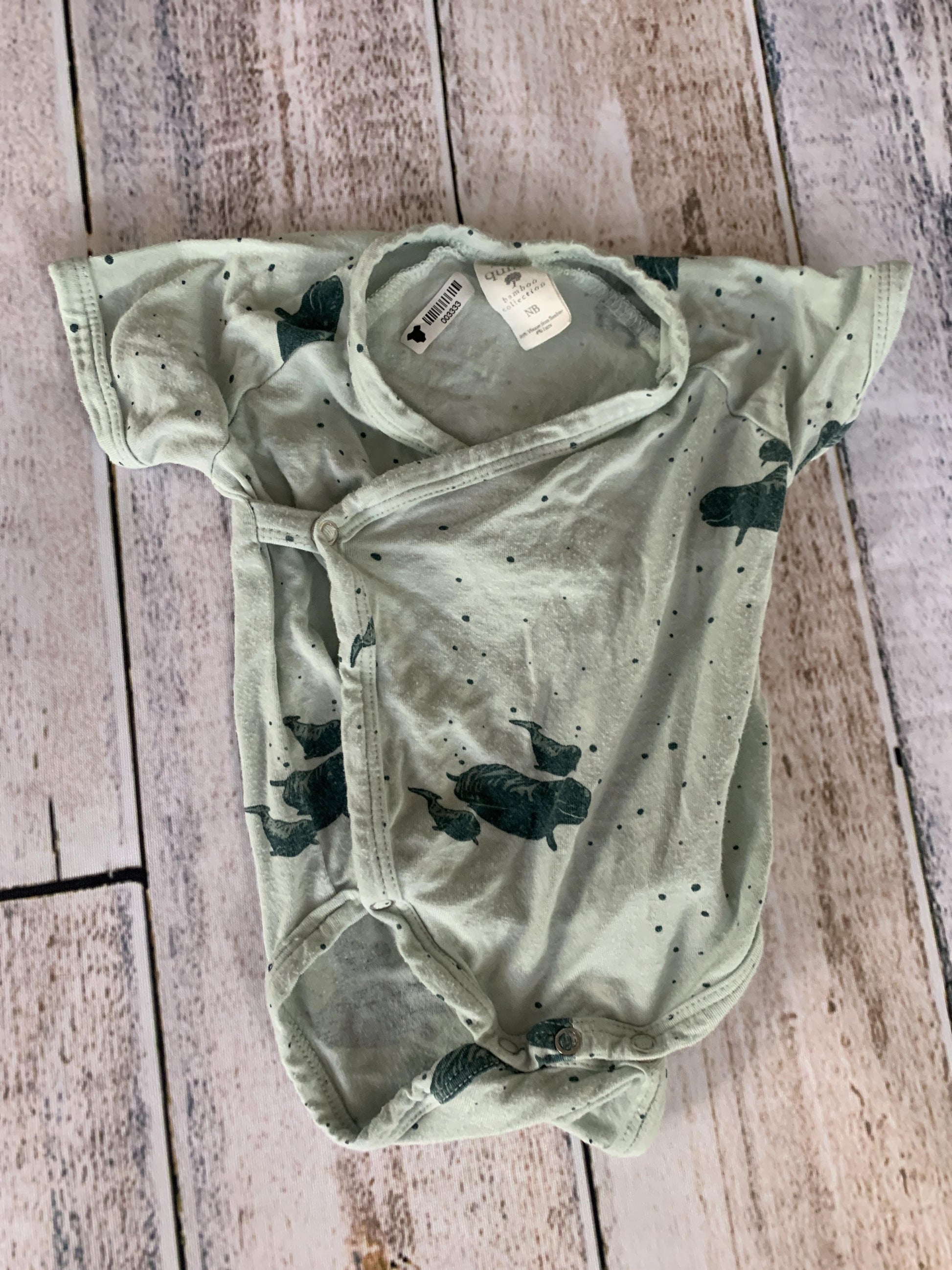 Kate Quinn Unisex Onesie Size: Newborn