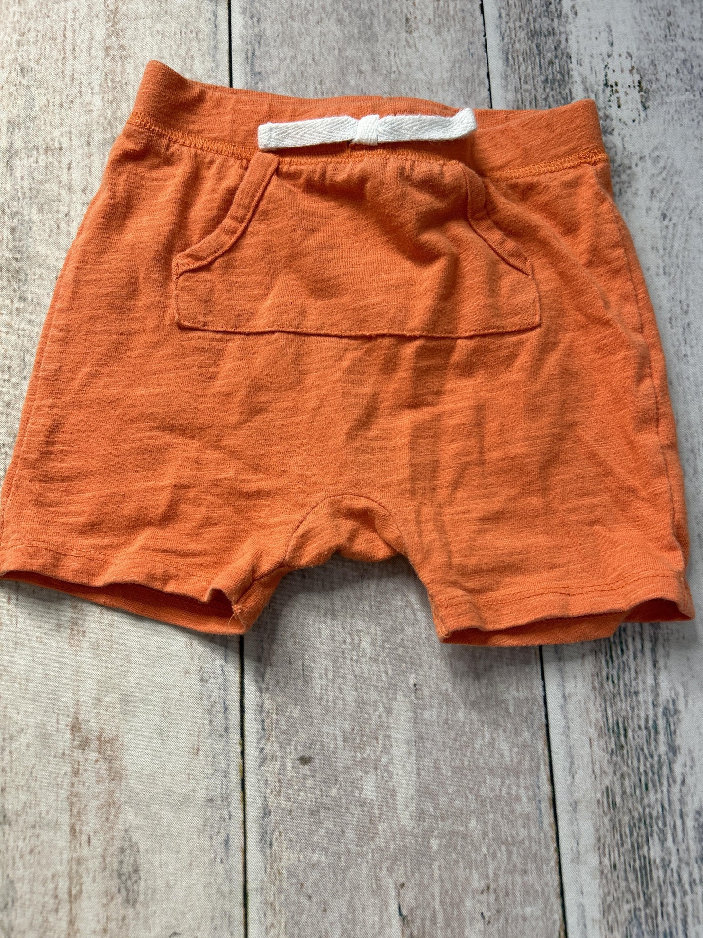 Unisex orange Shorts Size: 18 months orange