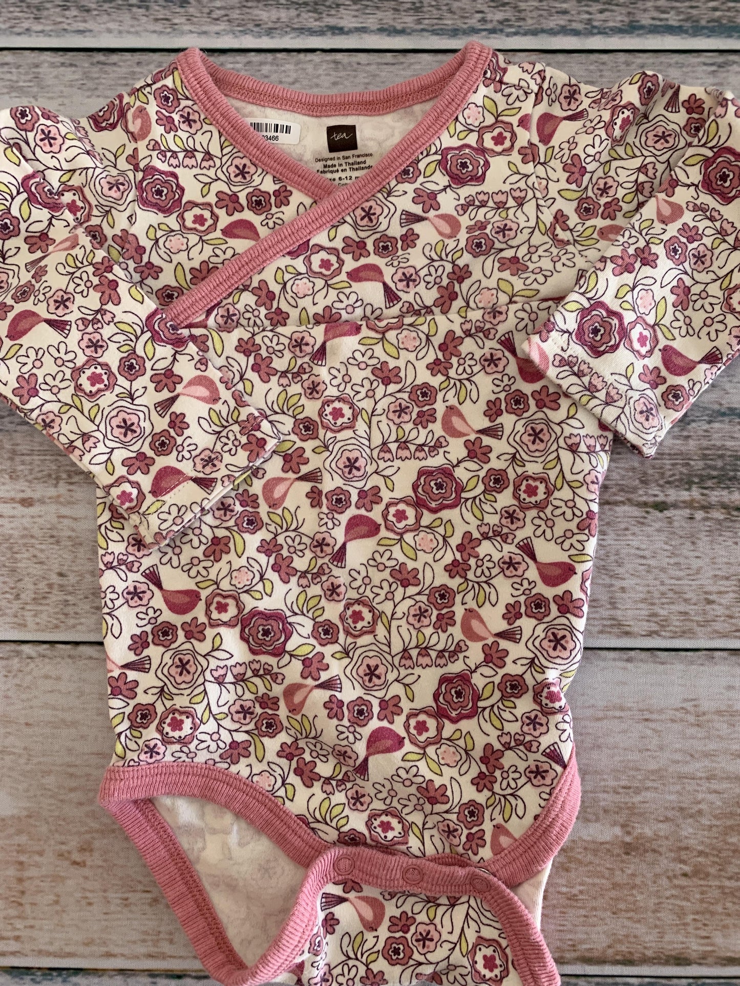 Tea Girls Pink floral | Indigo Onesie Size: 6-12 months Pink floral | Indigo