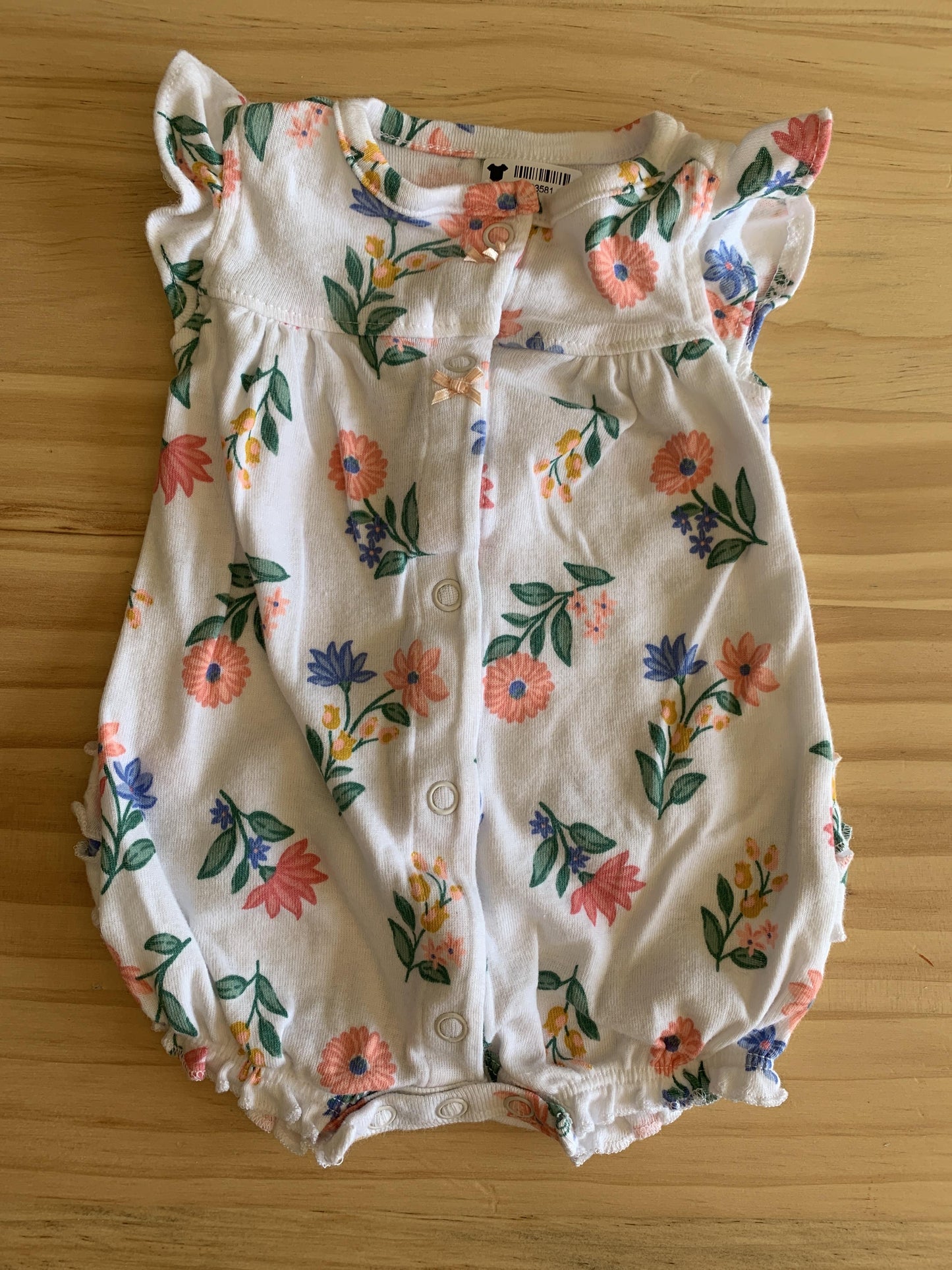 Girls Pink floral Romper Size: Newborn Pink floral