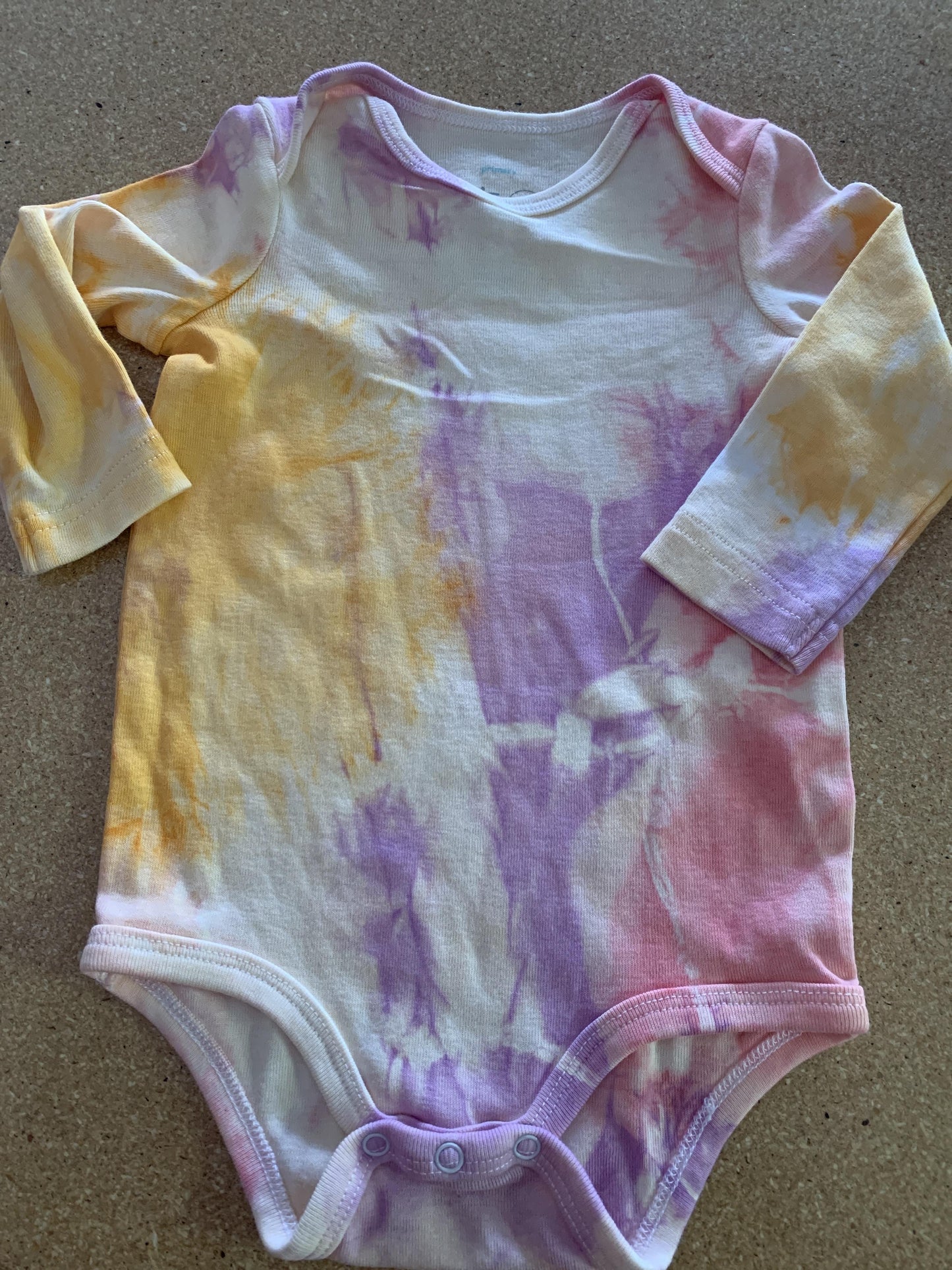 Girls pink | purple | Apricot Onesie Size: 3-6 months pink | purple | Apricot