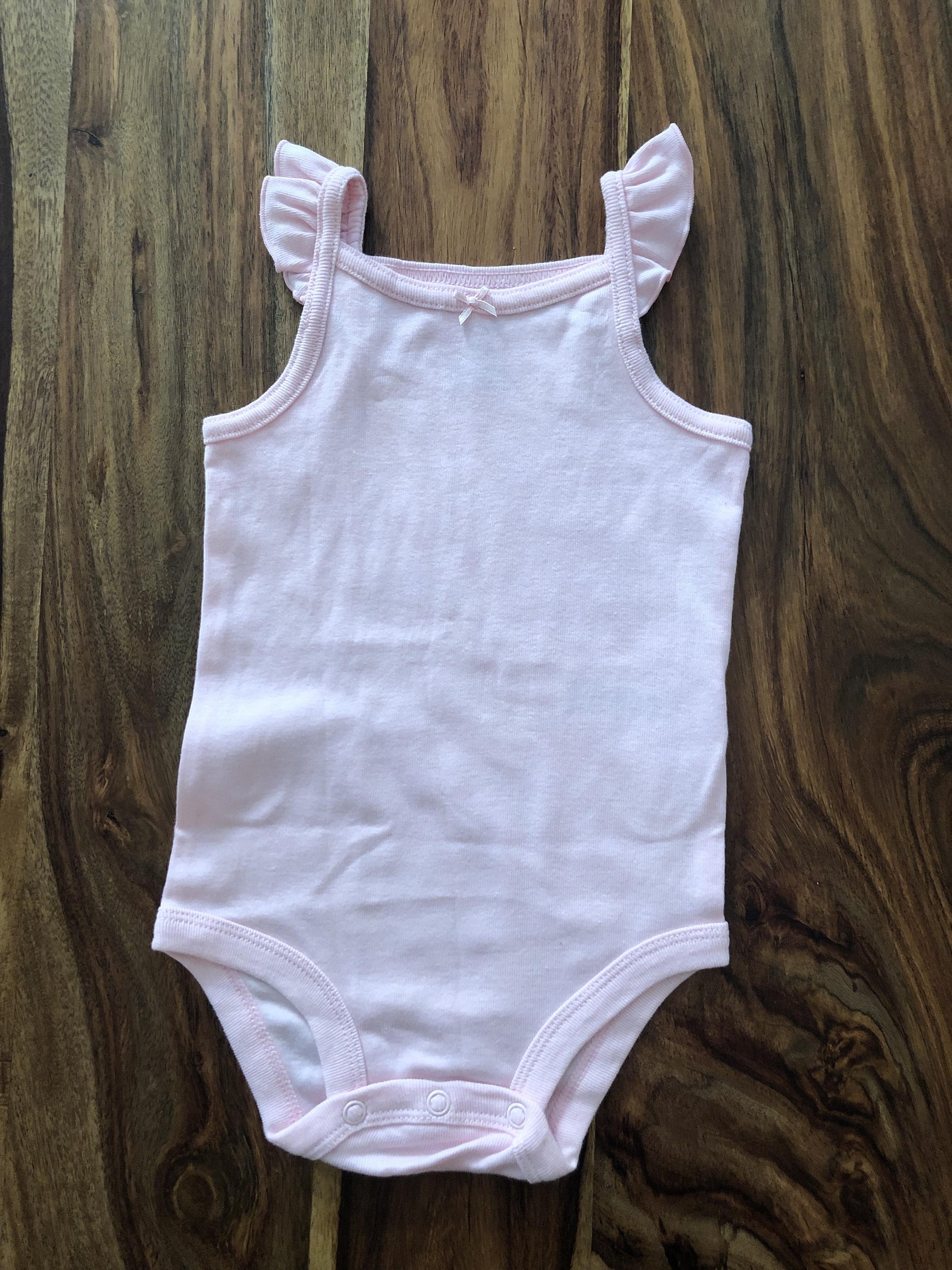 Carters Girls pink Onesie Size: 9 months pink