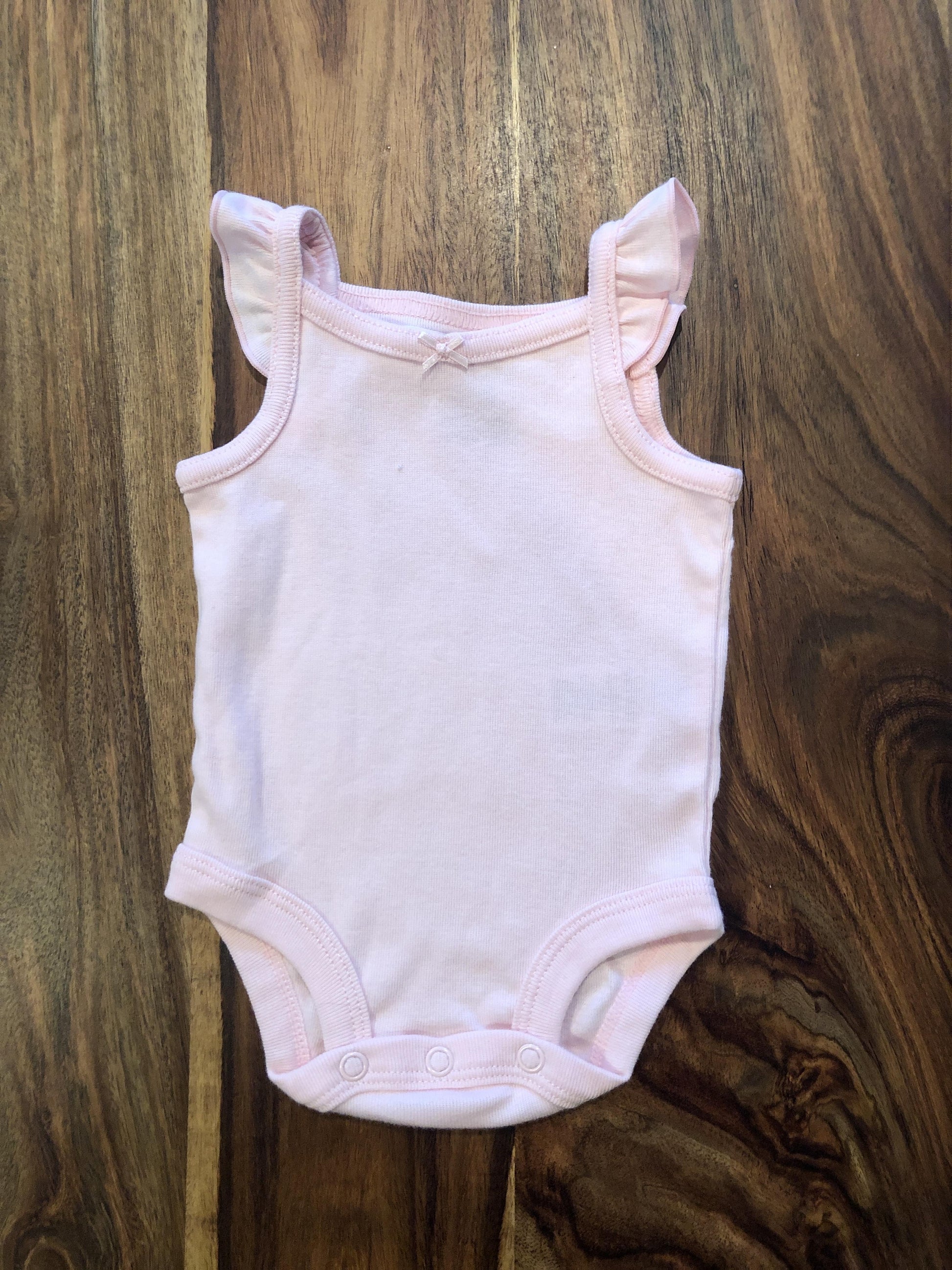 Carters Girls pink Onesie Size: Newborn pink