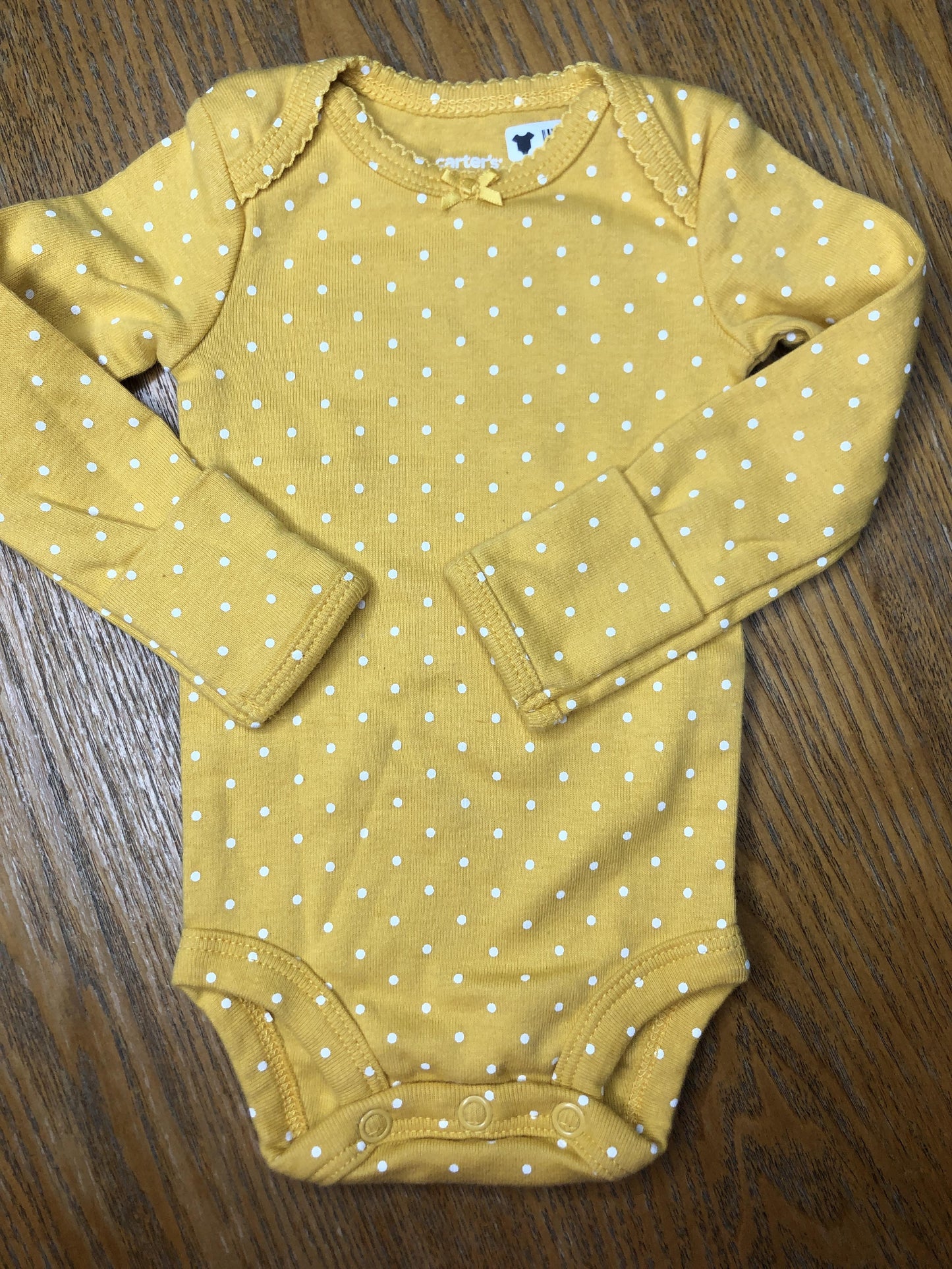 Carters Girls polka dot | Yellow Onesie Size: Newborn polka dot | Yellow