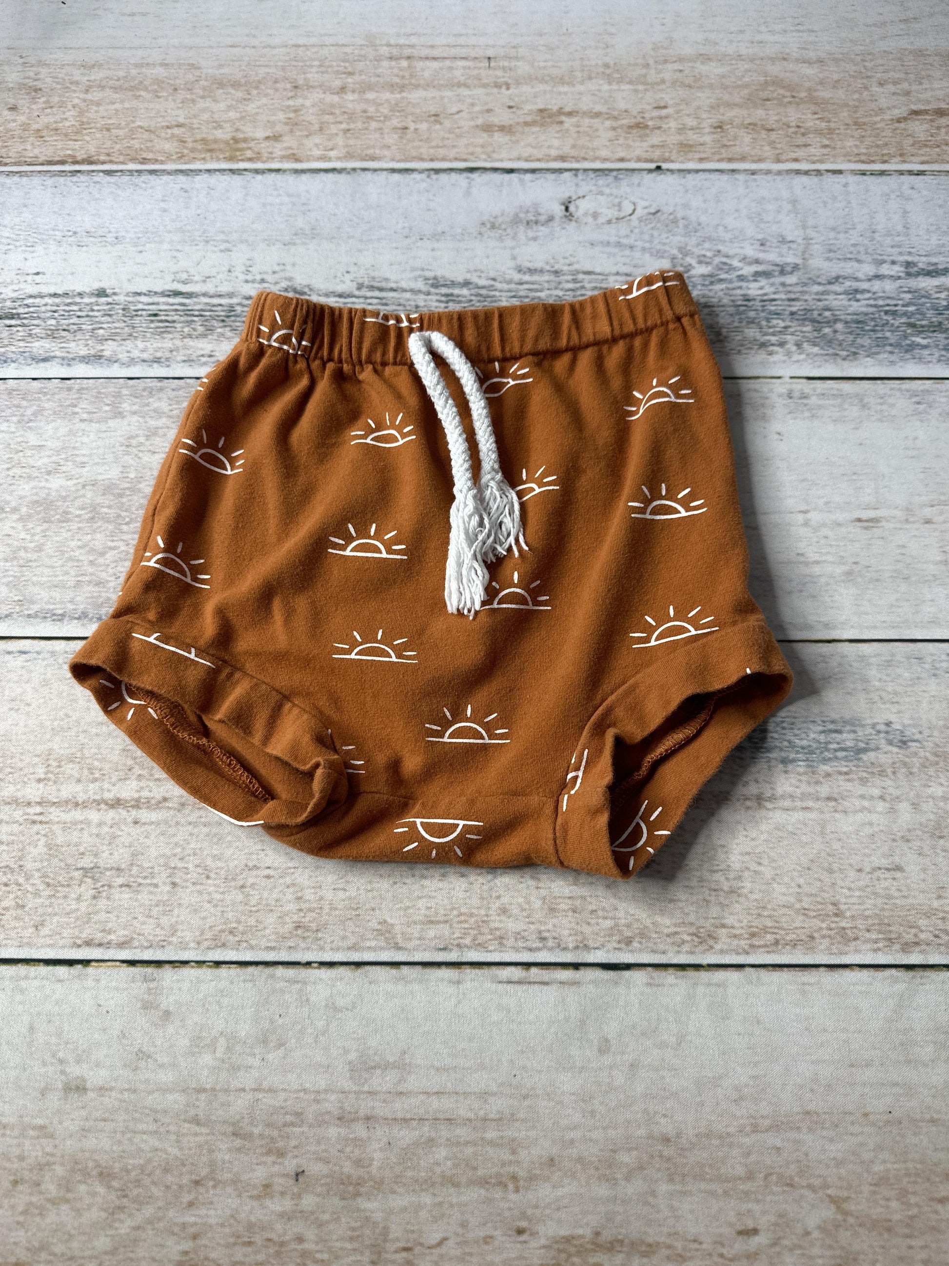 Unisex Rust | Sun Shorts Size: 18-24 months Rust | Sun