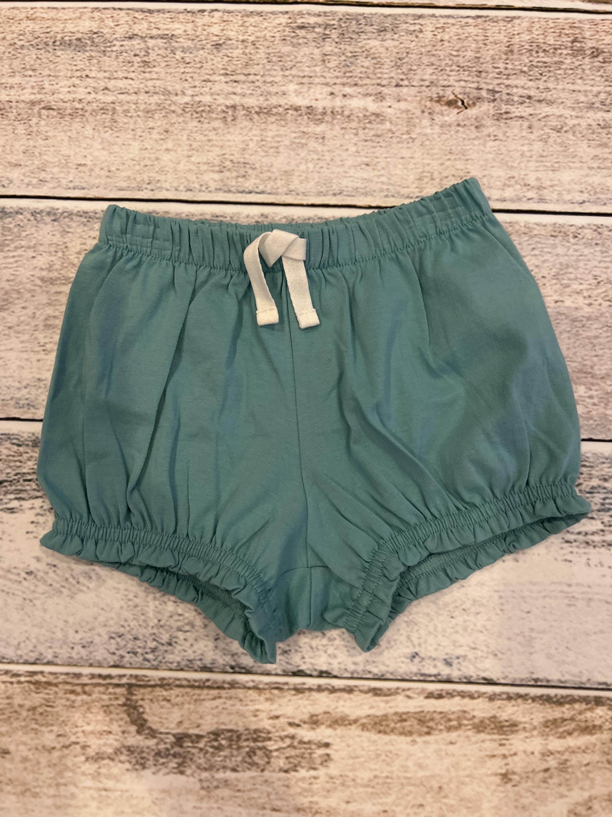 Primary Girls Teal Shirt Size: 6-12 months Teal