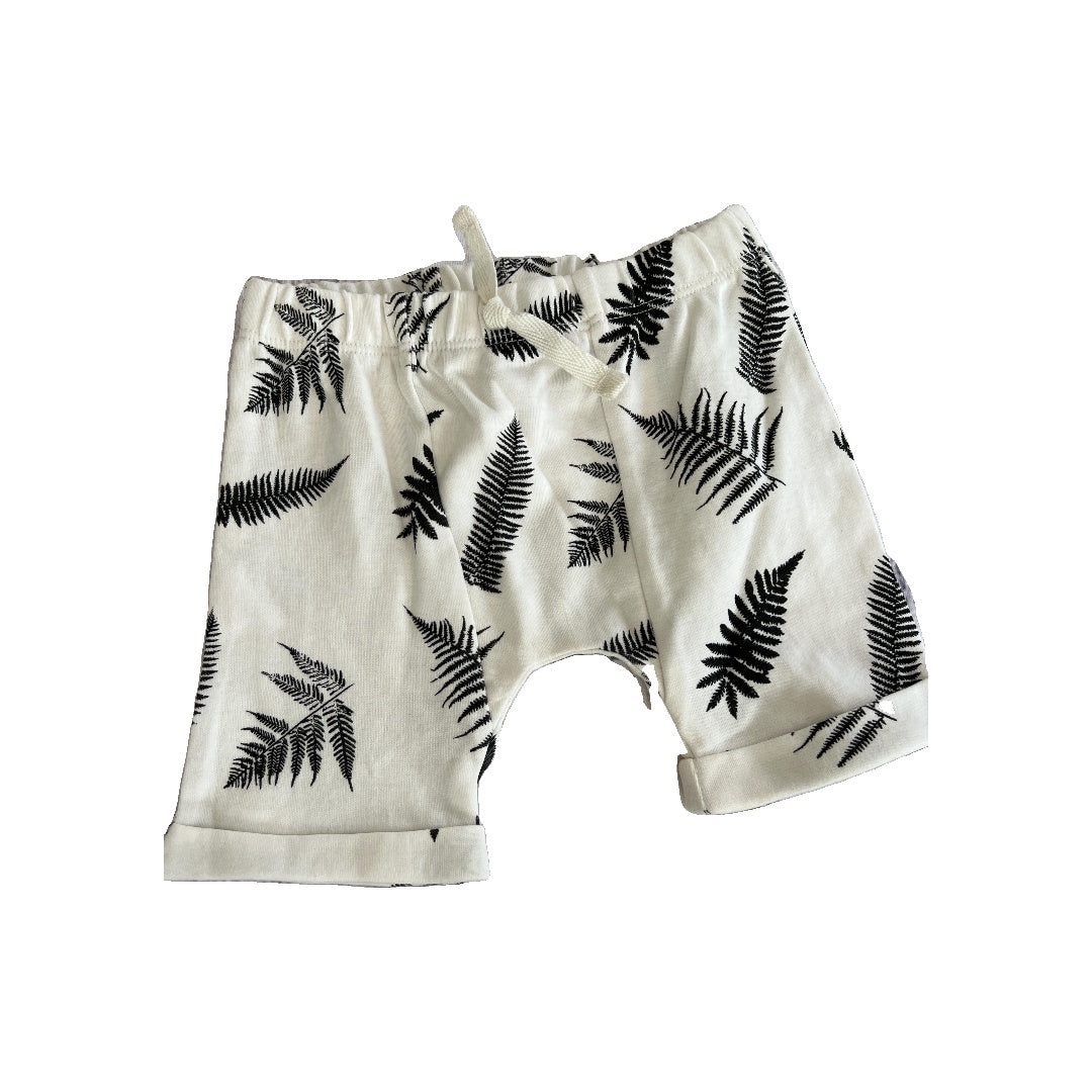 Kate Quinn Unisex White | Black | Pattern Shorts Size: 6-12 months White | Black | Pattern