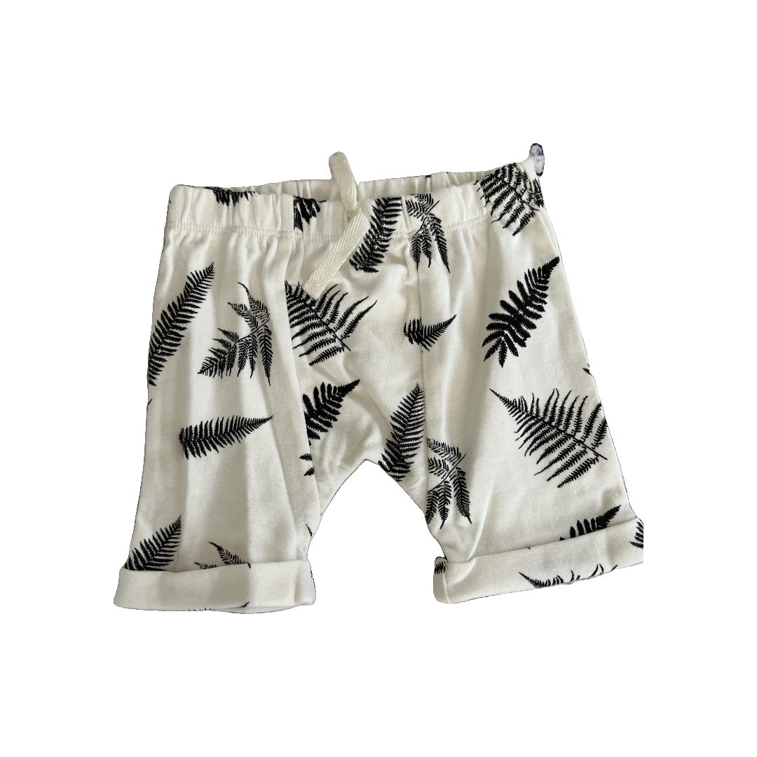Kate Quinn Unisex White | Black | Pattern Shorts Size: 6-12 months White | Black | Pattern