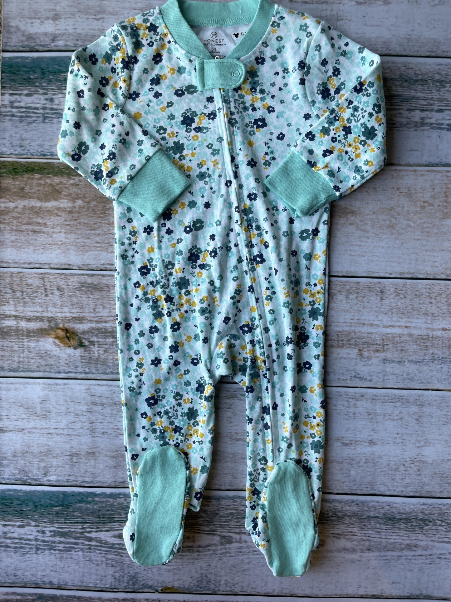 Honest Co Girls White | Flowers | Light Blue | Turquoise | Yellow Pajamas Size: 6-9 months White | Flowers | Light Blue | Turquoise | Yellow