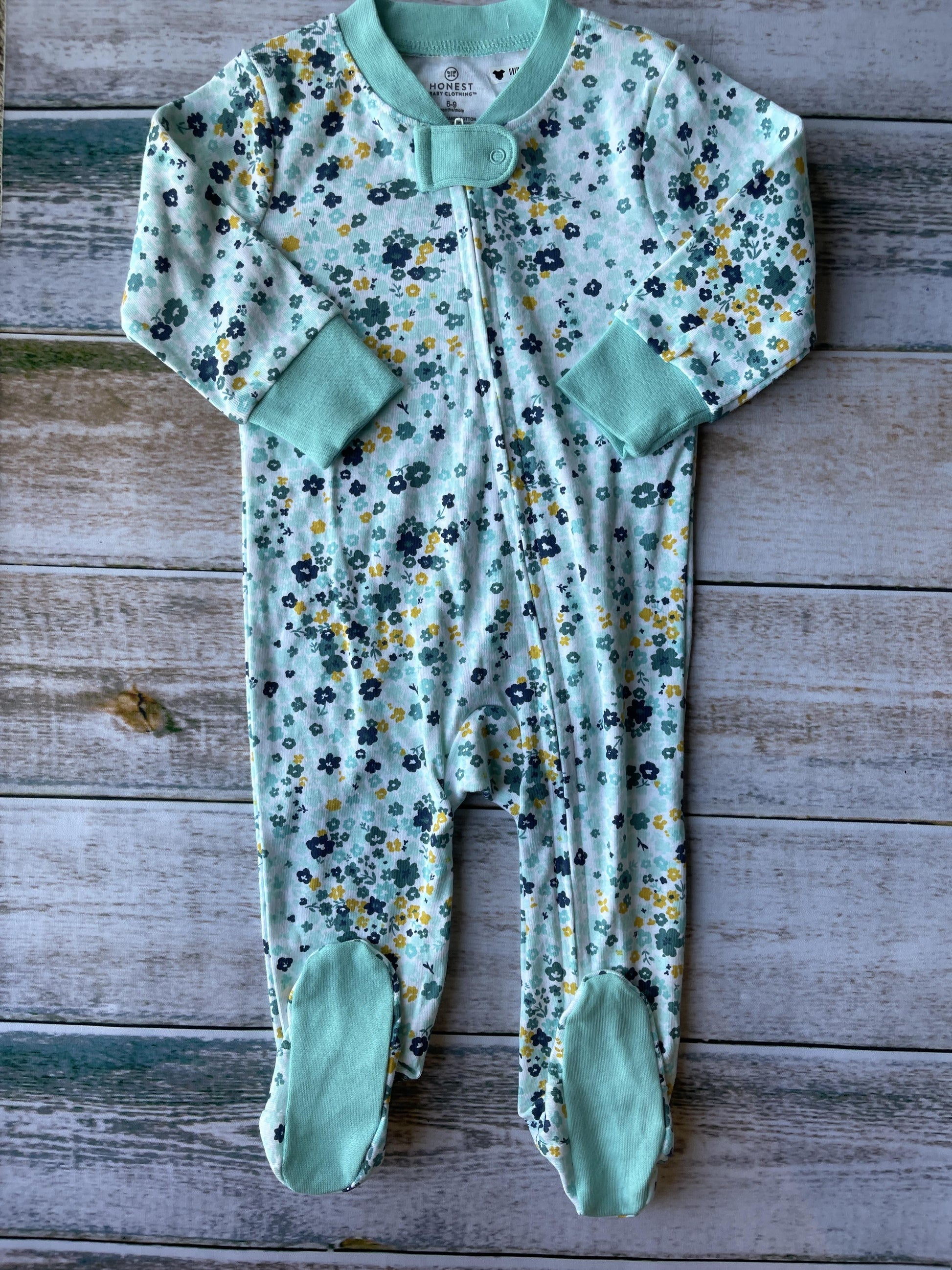 Honest Co Girls White | Flowers | Light Blue | Turquoise | Yellow Pajamas Size: 6-9 months White | Flowers | Light Blue | Turquoise | Yellow