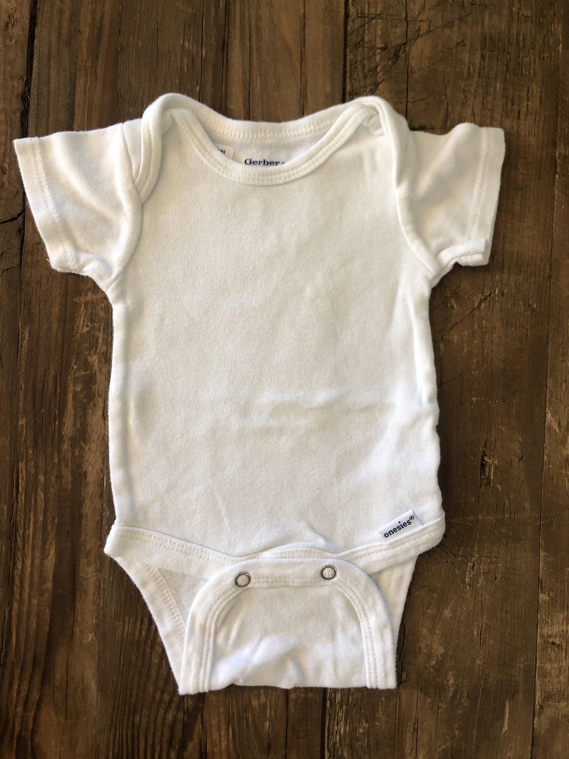 Gerber Childrenswear Girls White Onesie Size: Newborn White